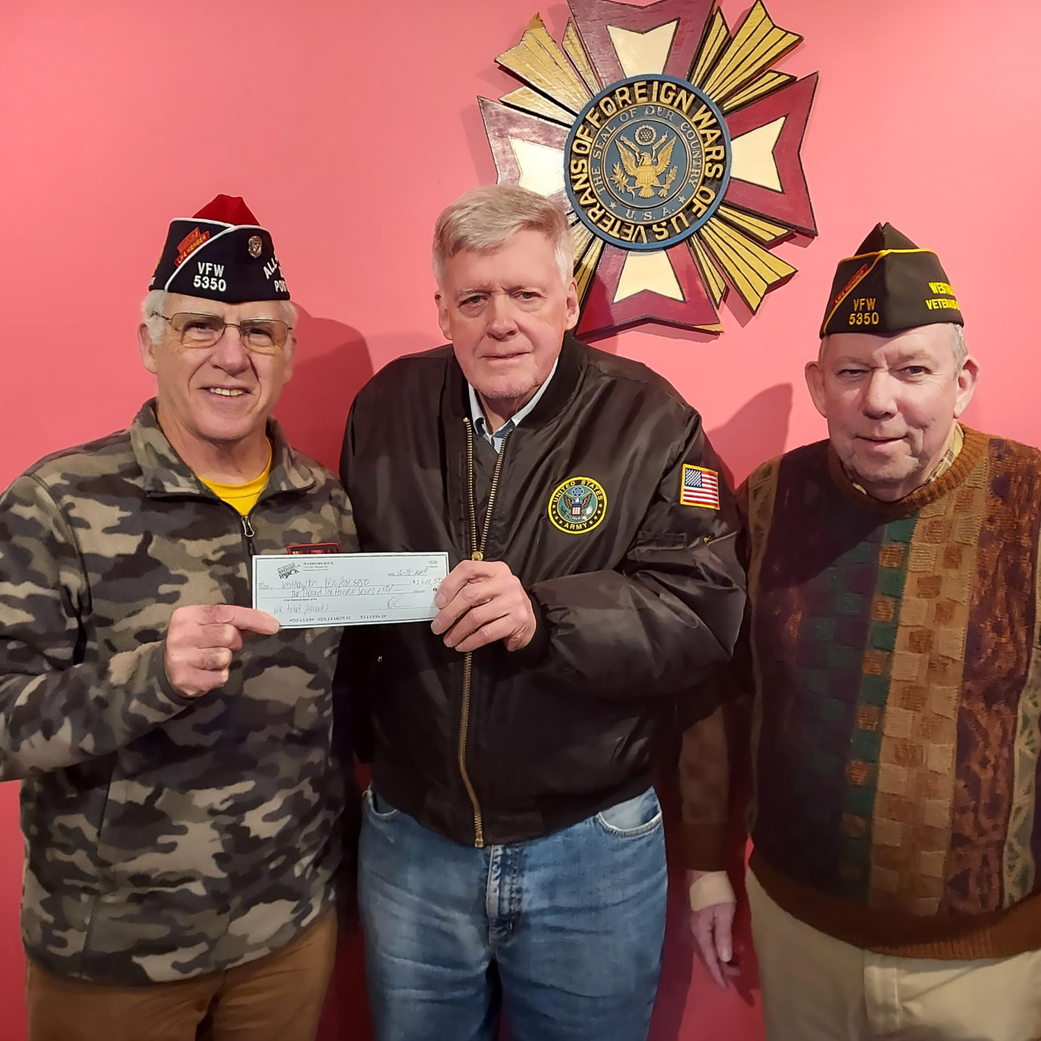 George Motz, an organizer of the Warriors Rock Veterans Day Weekend Concert at Westhampton Beach Performing Arts Center, recently  distributed proceeds to veterans organizations. From left, Westhampton Beach VFW Post #5350 Commander Bill Hughes, Motz, and Thomas Quinn; and Michael Berdinka, Westhampton Beach American Legion Post #834 Commander Tom Hadlock, Motz, and Lisha Jones. Hampton Bays Post #924 also received a donation. COURTESY GEORGE MOTZ