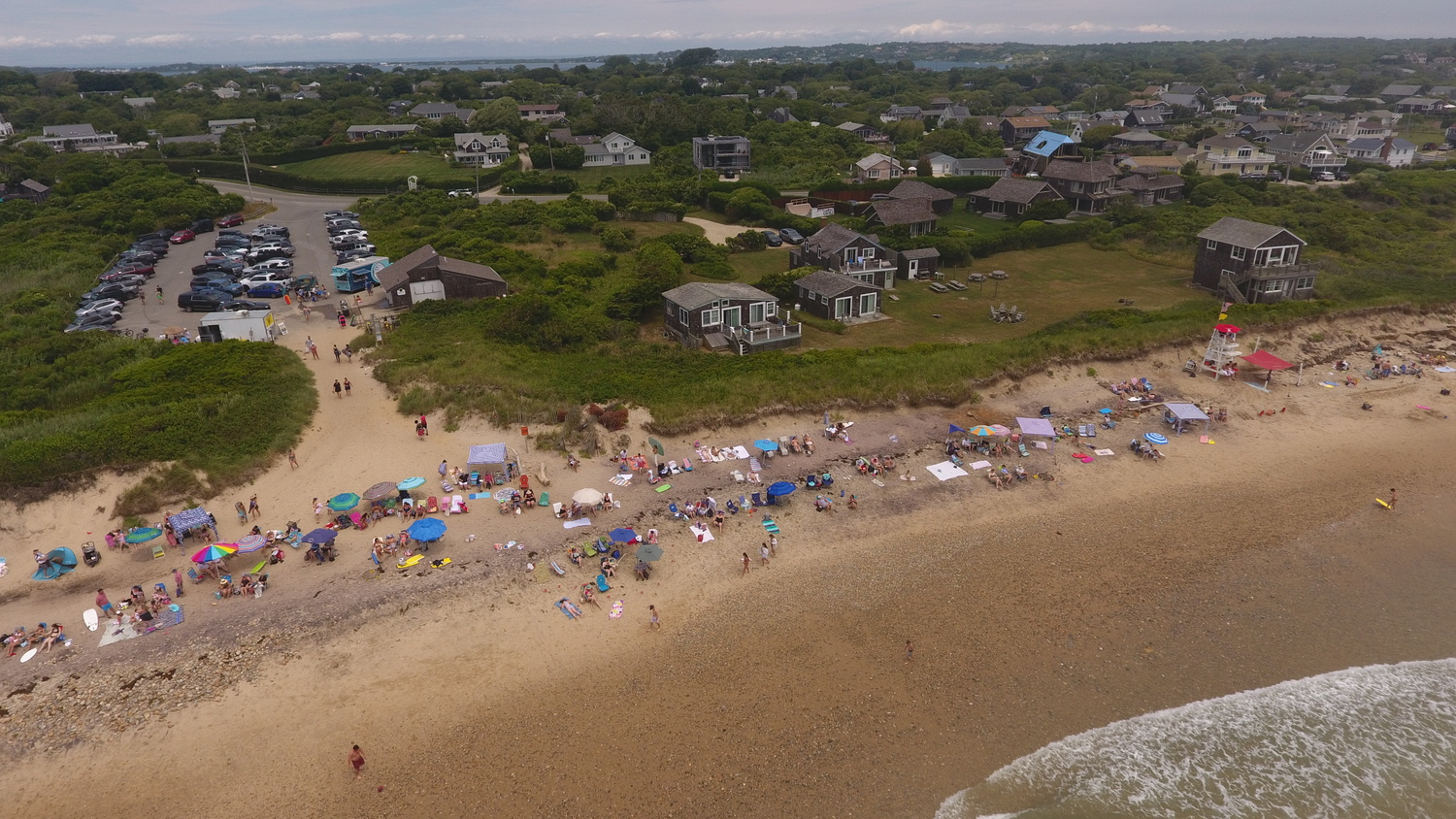 Ditch Plains has suffered from eroding beaches for years, as the dunes have steadily retreated toward a cluster of homes sitting in the low area between two town parking lots. MICHAEL WRIGHT