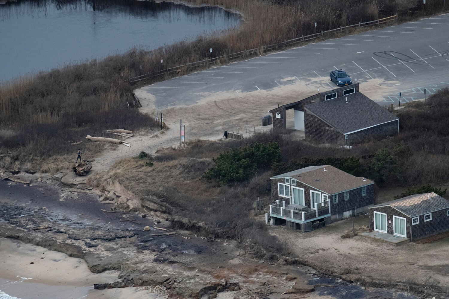 Ditch Plains has suffered from eroding beaches for years, as the dunes have steadily retreated toward a cluster of homes sitting in the low area between two town parking lots. DOUG KUNTZ