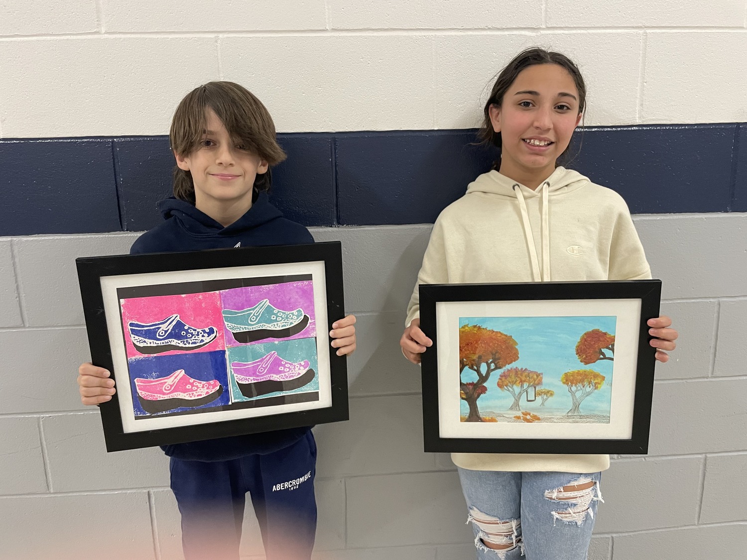 The artwork of Dayton Avenue Elementary School sixth-grader Logan McManus and fifth grade student Emma Howard were selected for exhibit in the Colors of Long Island: Student Expressions Exhibition at the Long Island Museum in Stony Brook. COURTESY EASTPORT-SOUTH MANOR SCHOOL DISTRICT