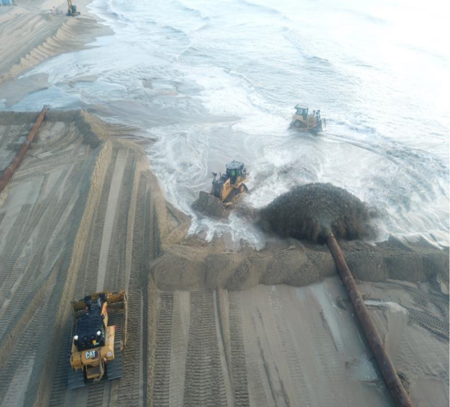 Some 600,000 tons of sand will be pumped ashore from a 493-foot hopper dredge. GREAT LAKES DREDGE & DOCK