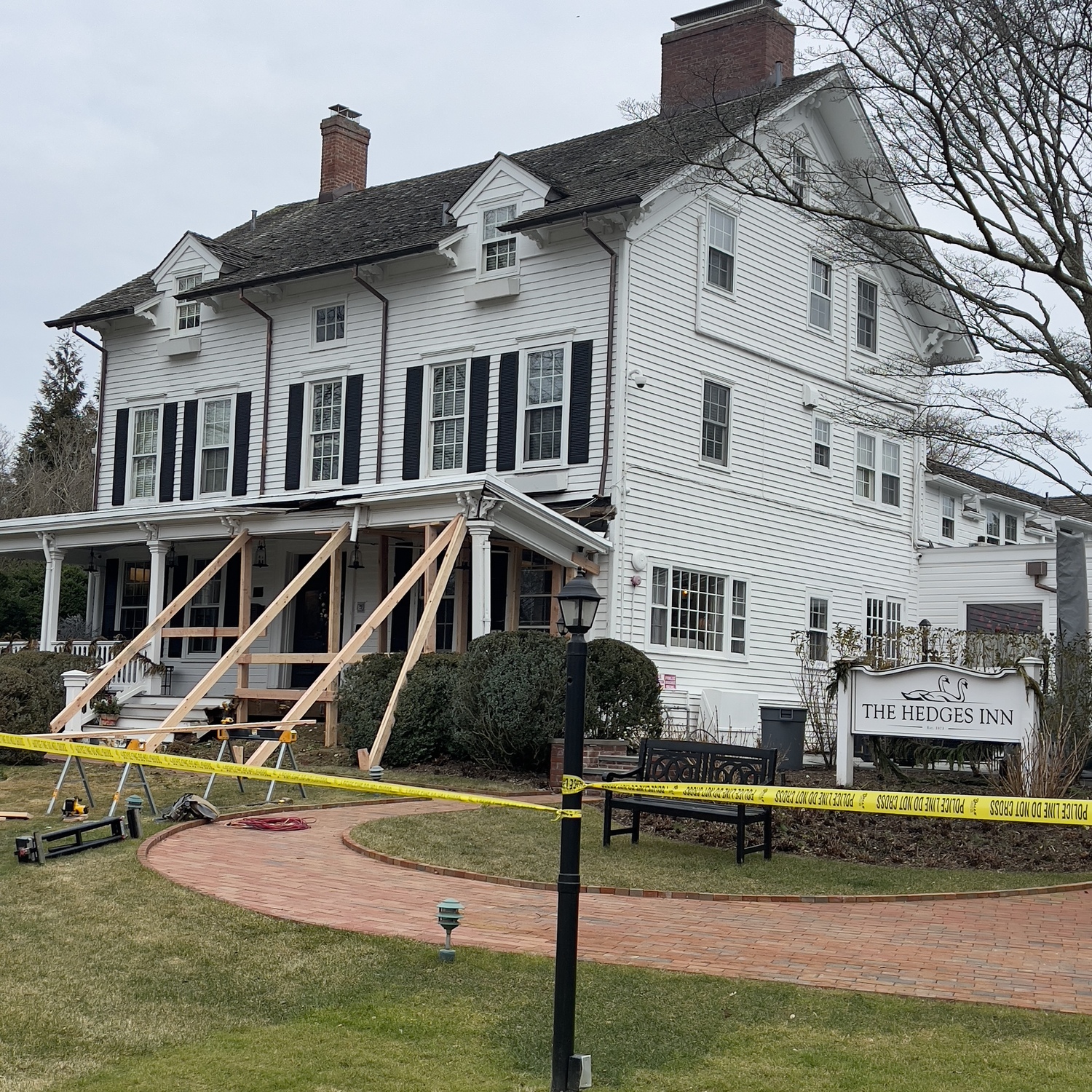 The building's front porch had to be shored up on Monday. DOUG KUNTZ