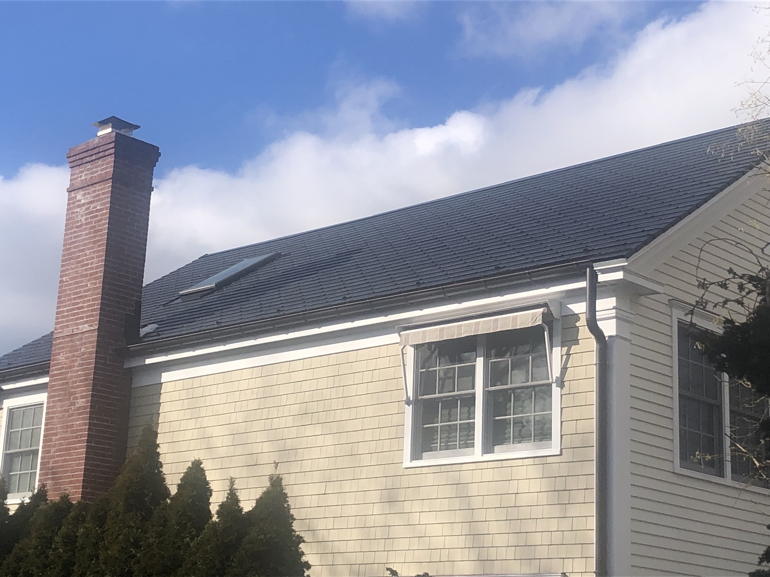 Tesla solar roof shingles in Sag Harbor. They cost more upfront, but are three-times stronger than traditional shingles, and produce clean energy that lowers the electric bill. JENNY NOBLE