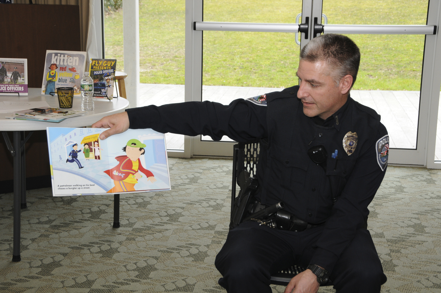 Southampton Town Police Officer Vincent Cagno visited the Hampton Library in Bridgehampton on Sunday as part of the Library's 