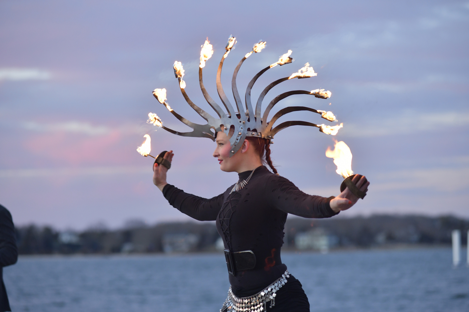 Fire dancer Anna Archaic performs with Keith Leaf and His Flaming Friends.