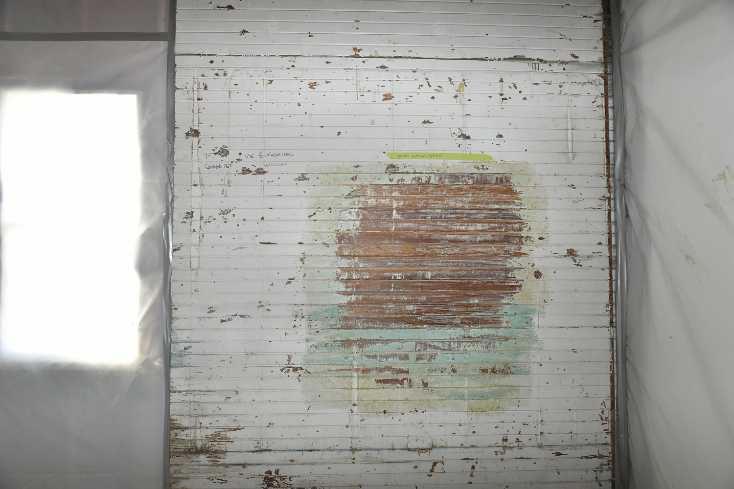 Paint has been stripped to reveal the original wood in the boathouse.  DANA SHAW