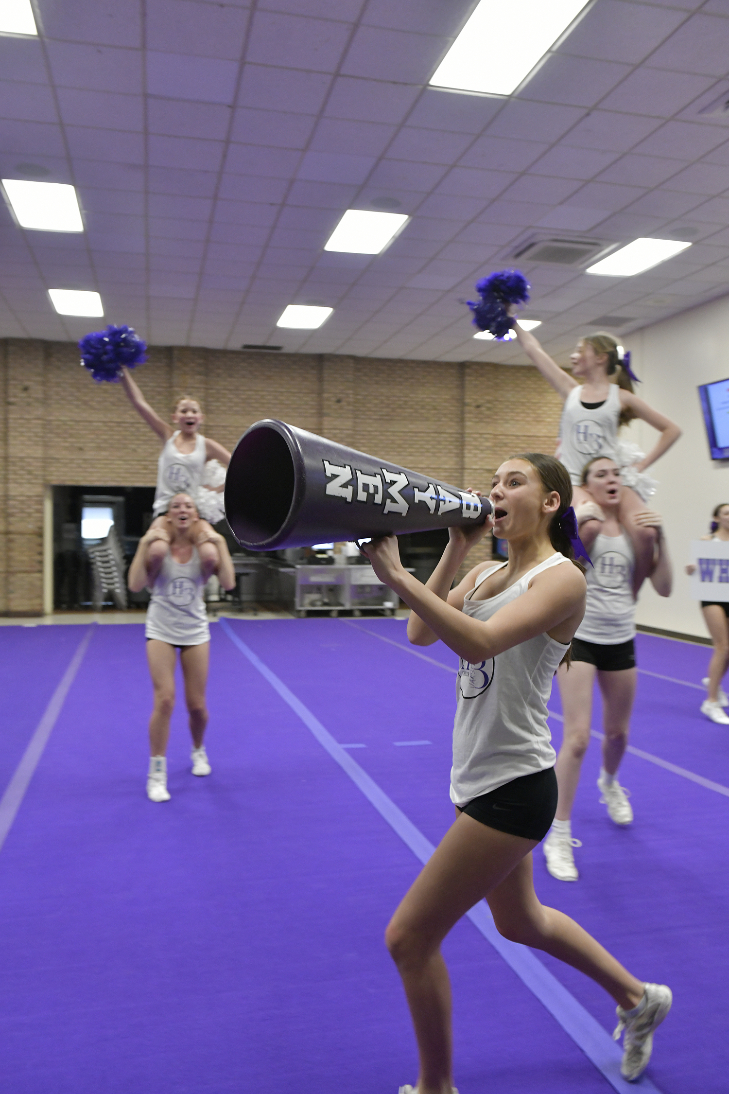 The Hampton Bays High School competitive cheerleading team at practice on February 9. For the first time since 2020, the team has advanced and qualified for the Suffolk County Championship on February 17.   DANA SHAW