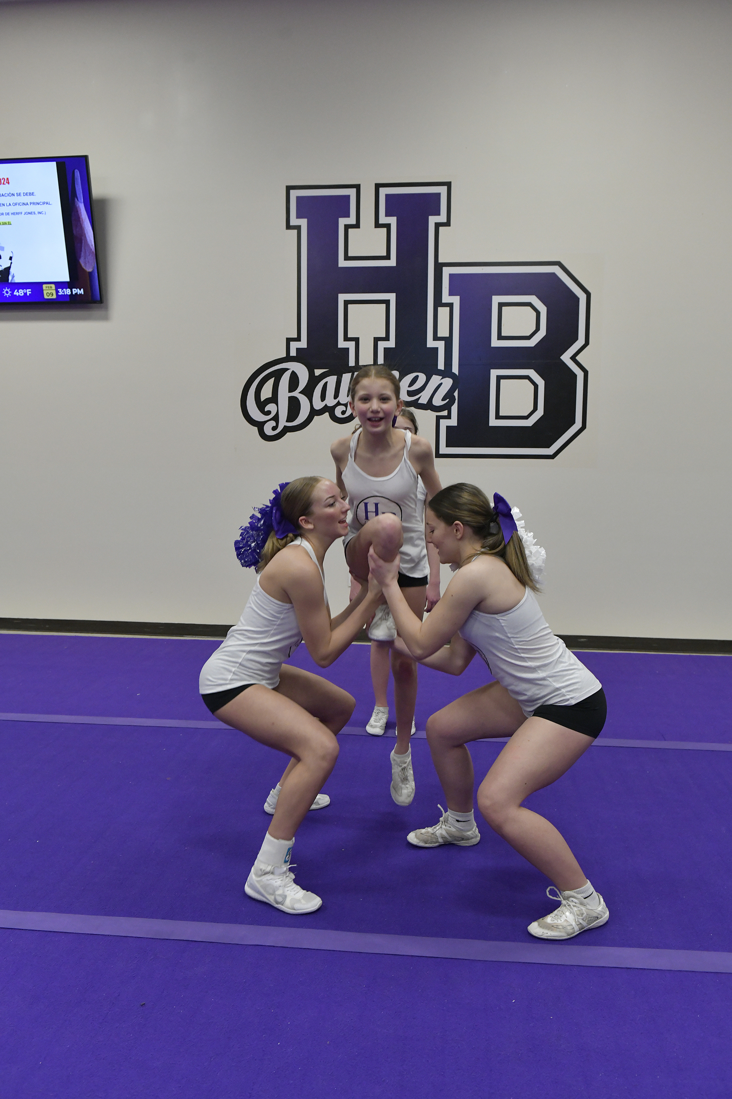 The Hampton Bays High School competitive cheerleading team at practice on February 9. For the first time since 2020, the team has advanced and qualified for the Suffolk County Championship on February 17.   DANA SHAW