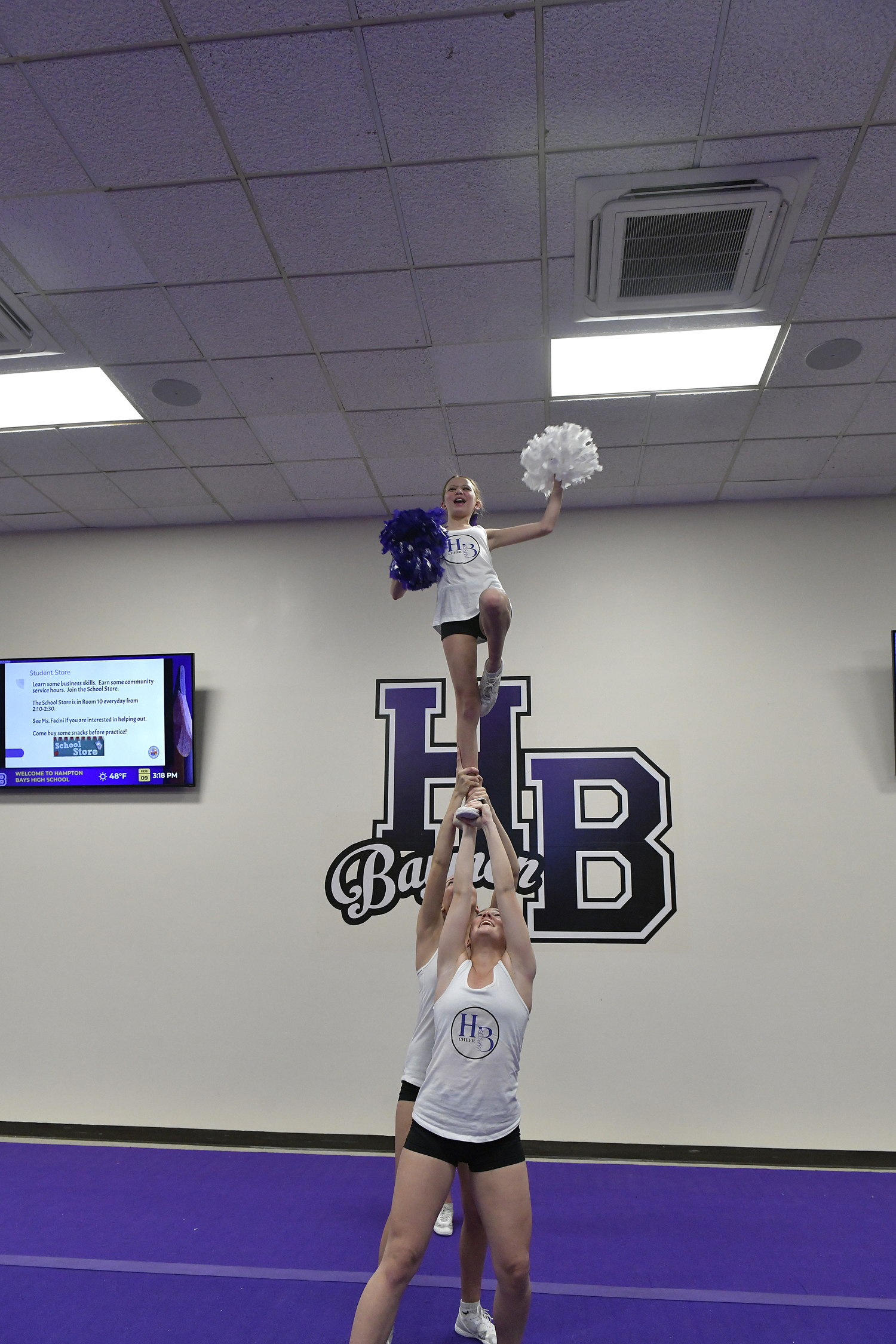 The Hampton Bays High School competitive cheerleading team at practice on February 9. For the first time since 2020, the team has advanced and qualified for the Suffolk County Championship on February 17.   DANA SHAW