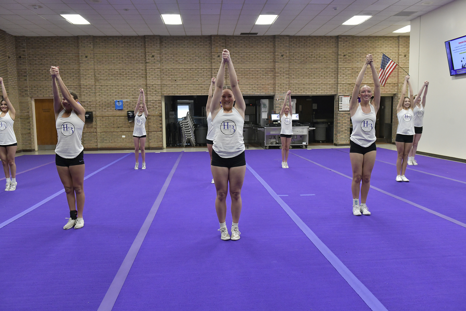 The Hampton Bays High School competitive cheerleading team at practice on February 9. For the first time since 2020, the team has advanced and qualified for the Suffolk County Championship on February 17.   DANA SHAW