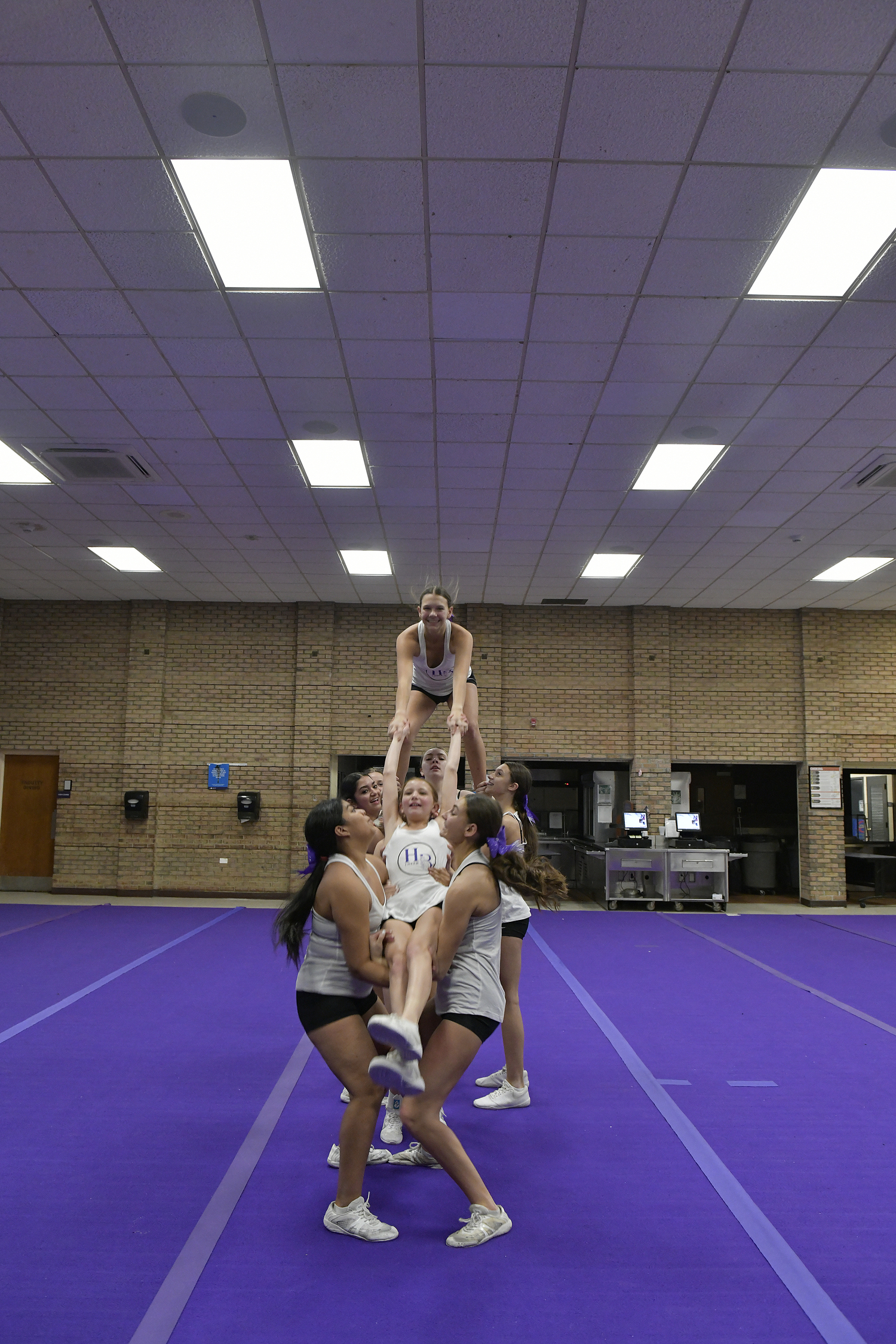 The Hampton Bays High School competitive cheerleading team at practice on February 9. For the first time since 2020, the team has advanced and qualified for the Suffolk County Championship on February 17.   DANA SHAW