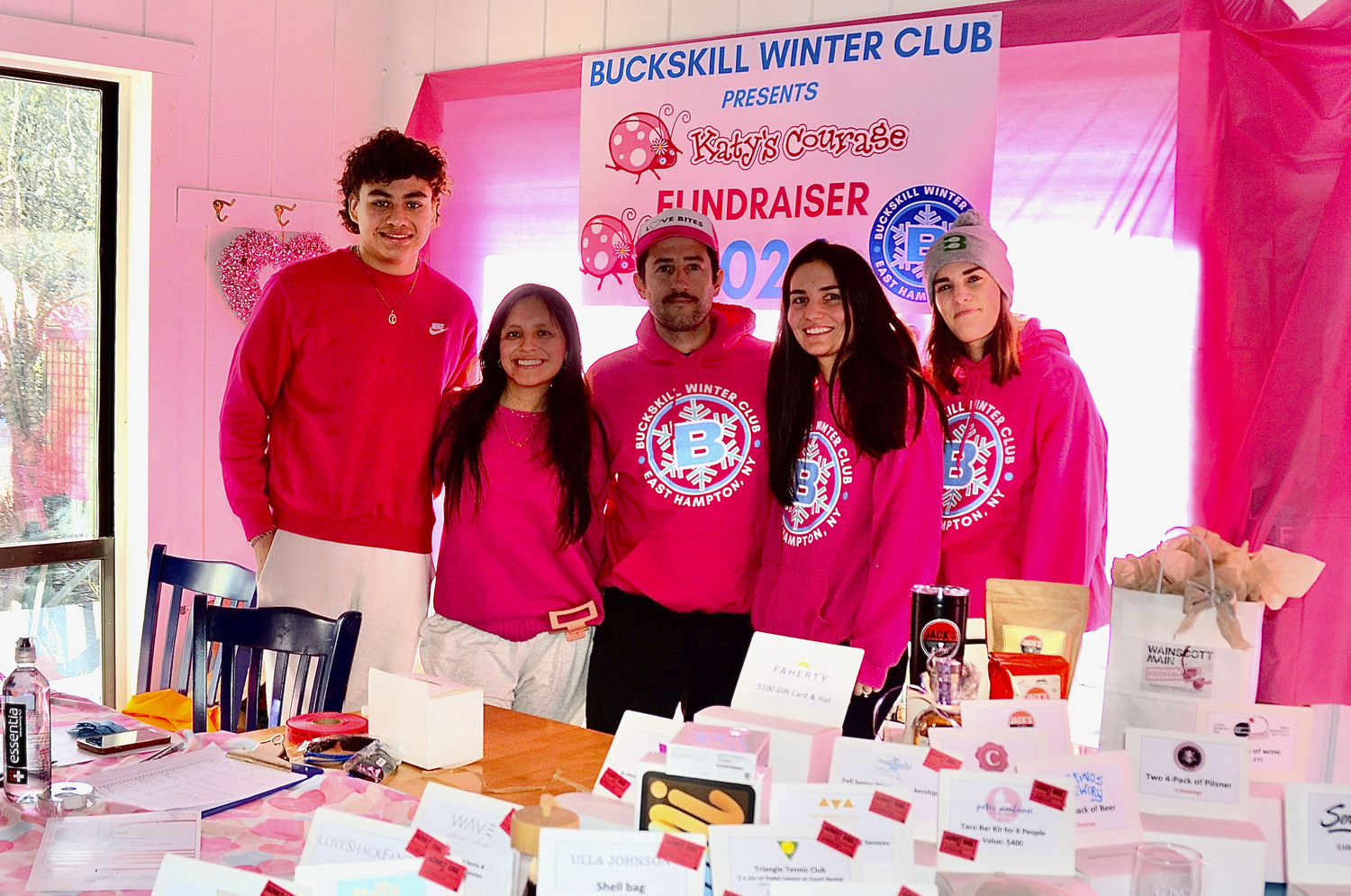 Volunteers Kevin Hilario, Samantha Pillco, Carlos La Riva, Anett Bako and Amandda Jackson at the Katy's Courage fundraiser at Buckskill  Winter Club on  Saturday afternoon.   KYRIL BROMLEY