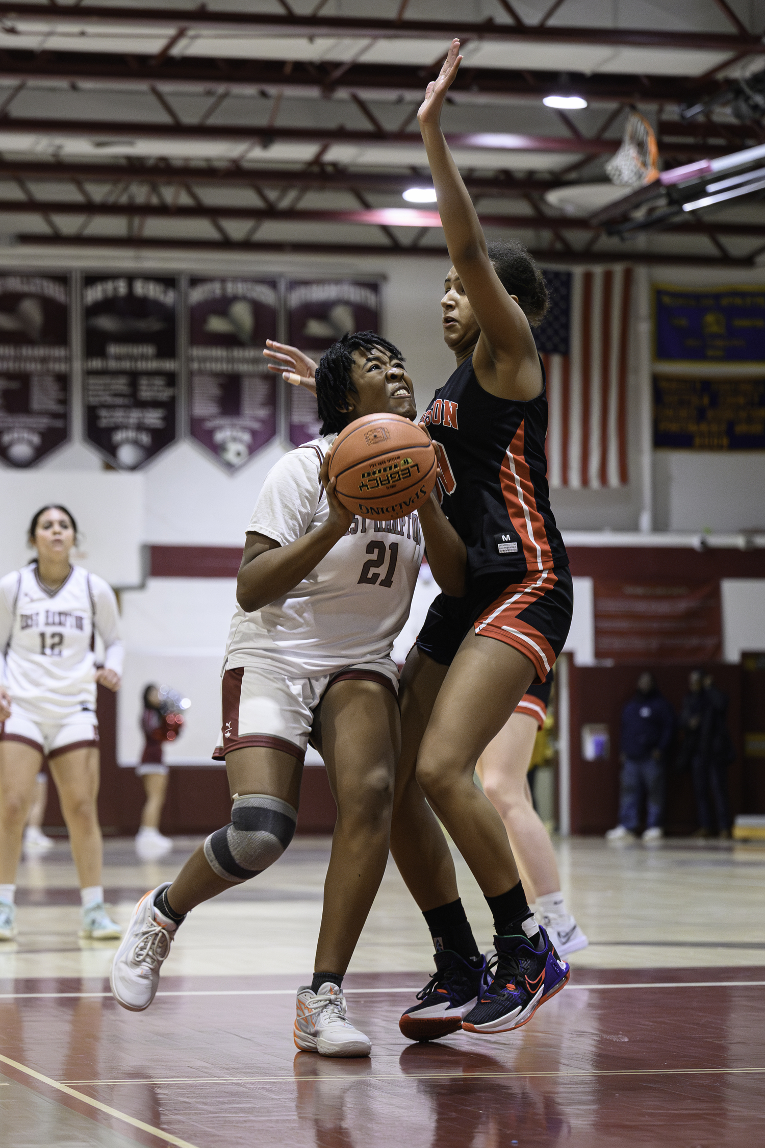 East Hampton sophomore guard Kaili Moore drives to the basket. MARIANNE BARNETT