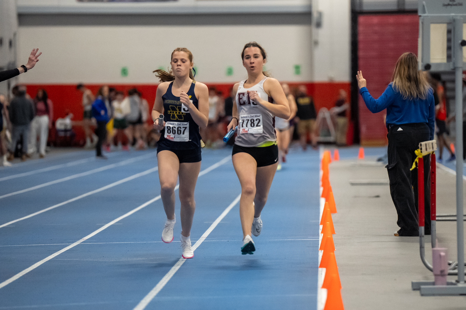 East Hampton senior Dylan Cashin running her leg of the 4x800-meter relay.   RON ESPOSITO