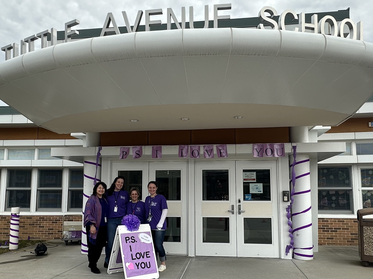 Tuttle Avenue Elementary School faculty welcomed students with love and kindness on P.S. I Love You Day. COURTESY EASTPORT-SOUTH MANOR SCHOOL DISTRICT
