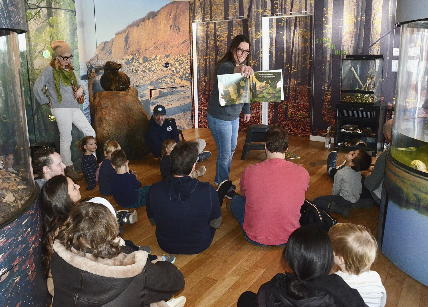 Kids of all ages enjoyed story time with Crystal Possehl-Oakes and learned about salamanders at the South Fork Natural History Museum on Sunday.  KYRIL BROMLEY