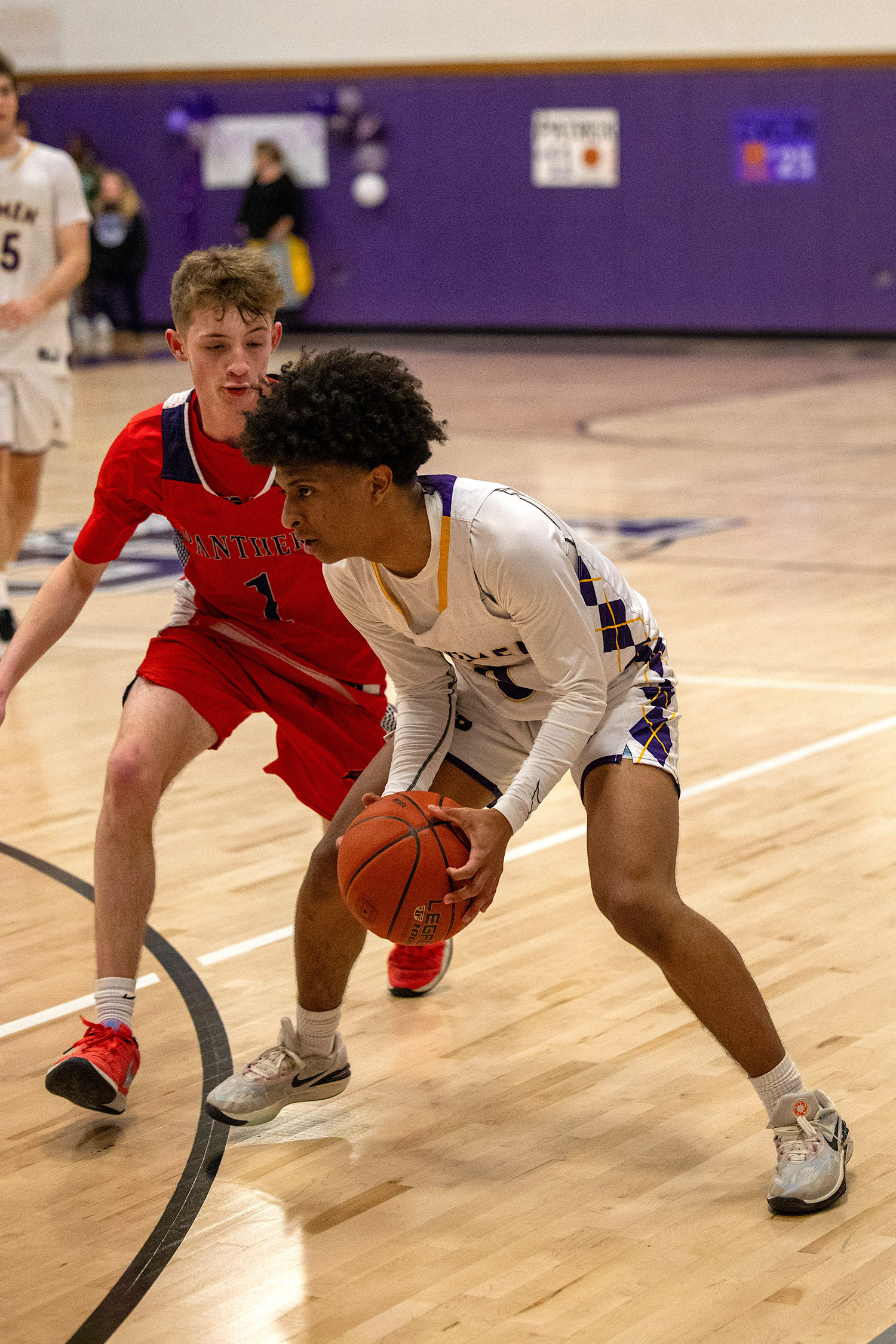 Senior guard Danny Wilson looks for the play. MICHAEL O'CONNOR