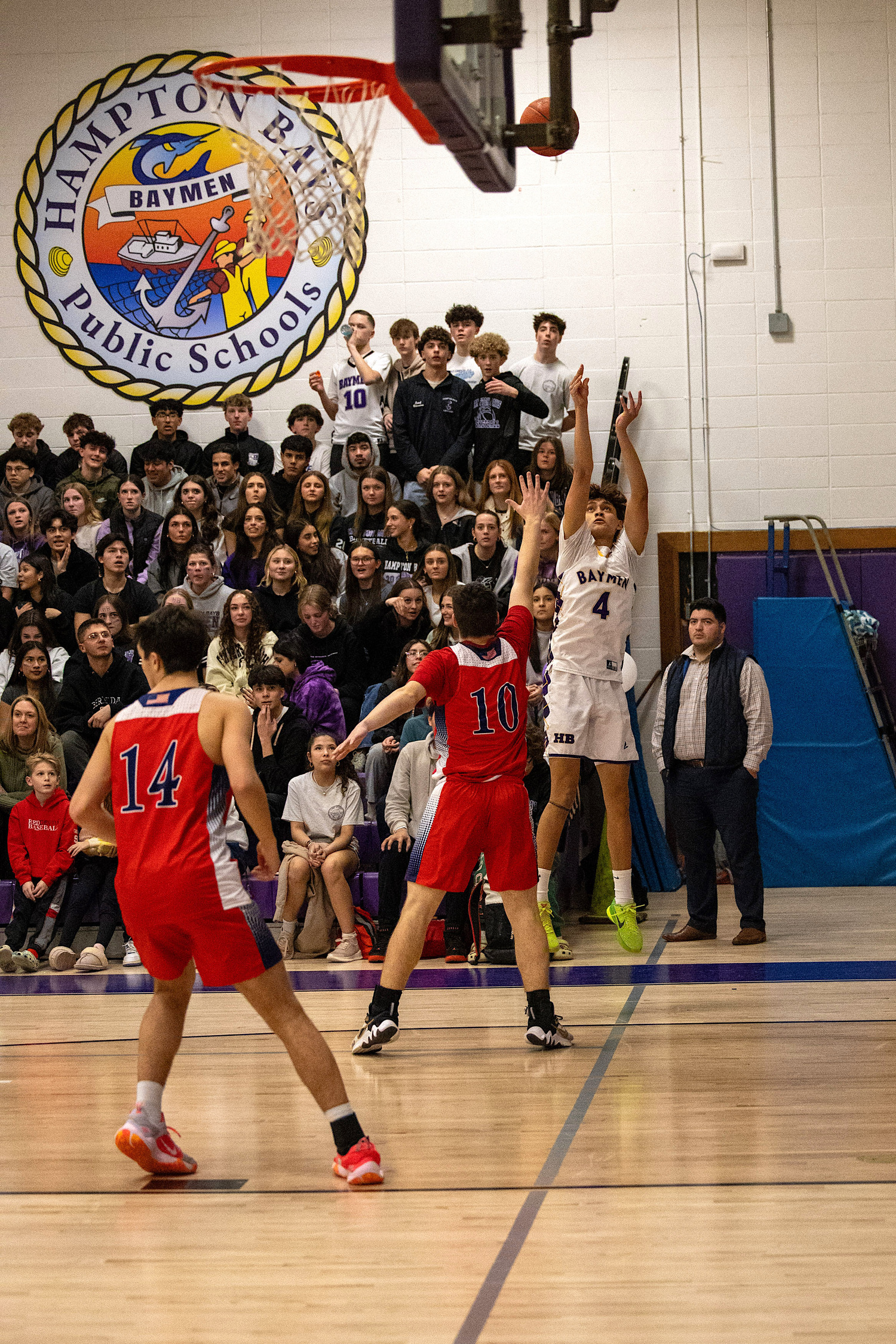 Senior forward Frank Galeas shoot from three-point range. MICHAEL O'CONNOR