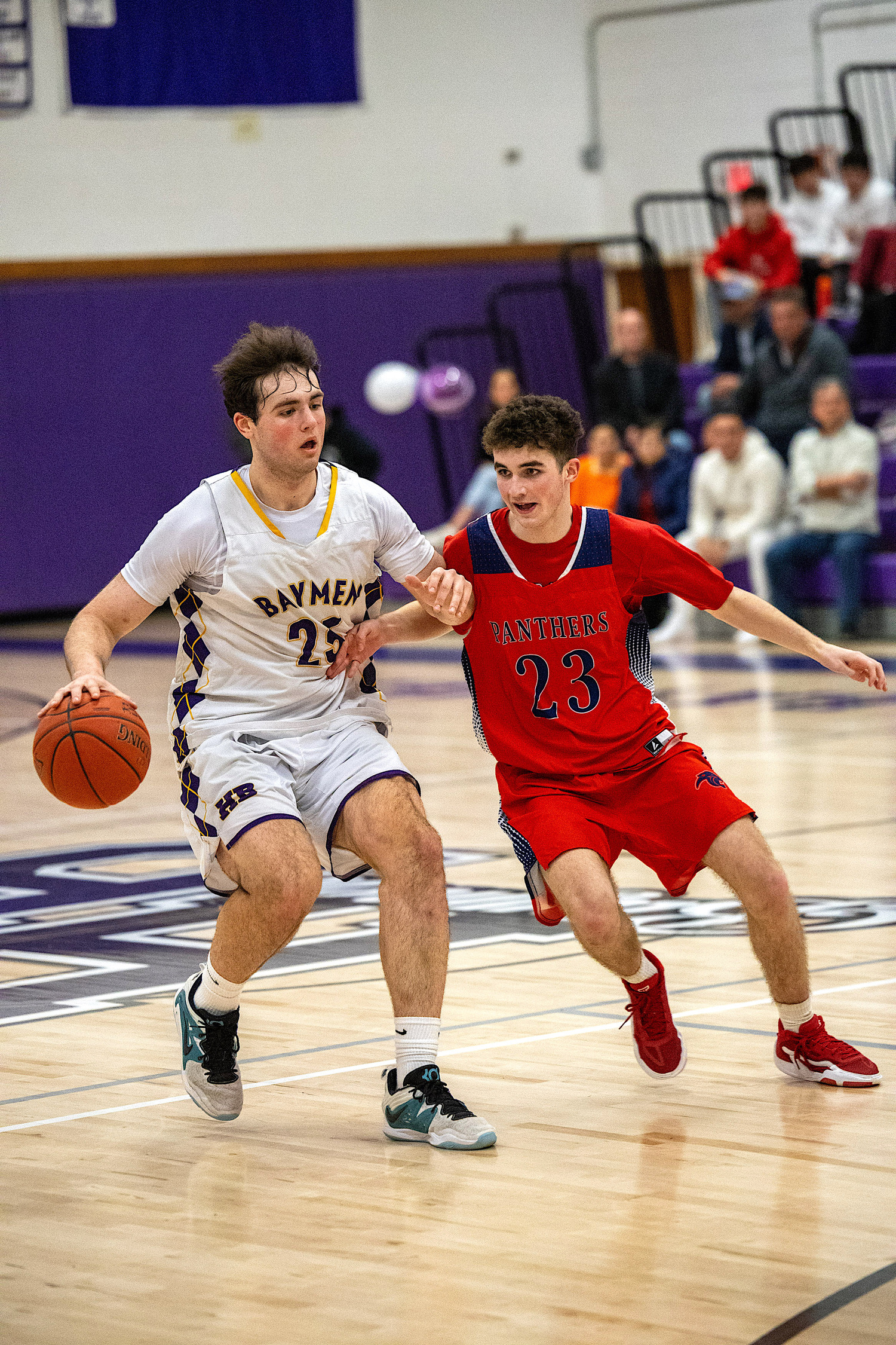 Senior forward Isaiah Lattanzio powers to the basket. MICHAEL O'CONNOR