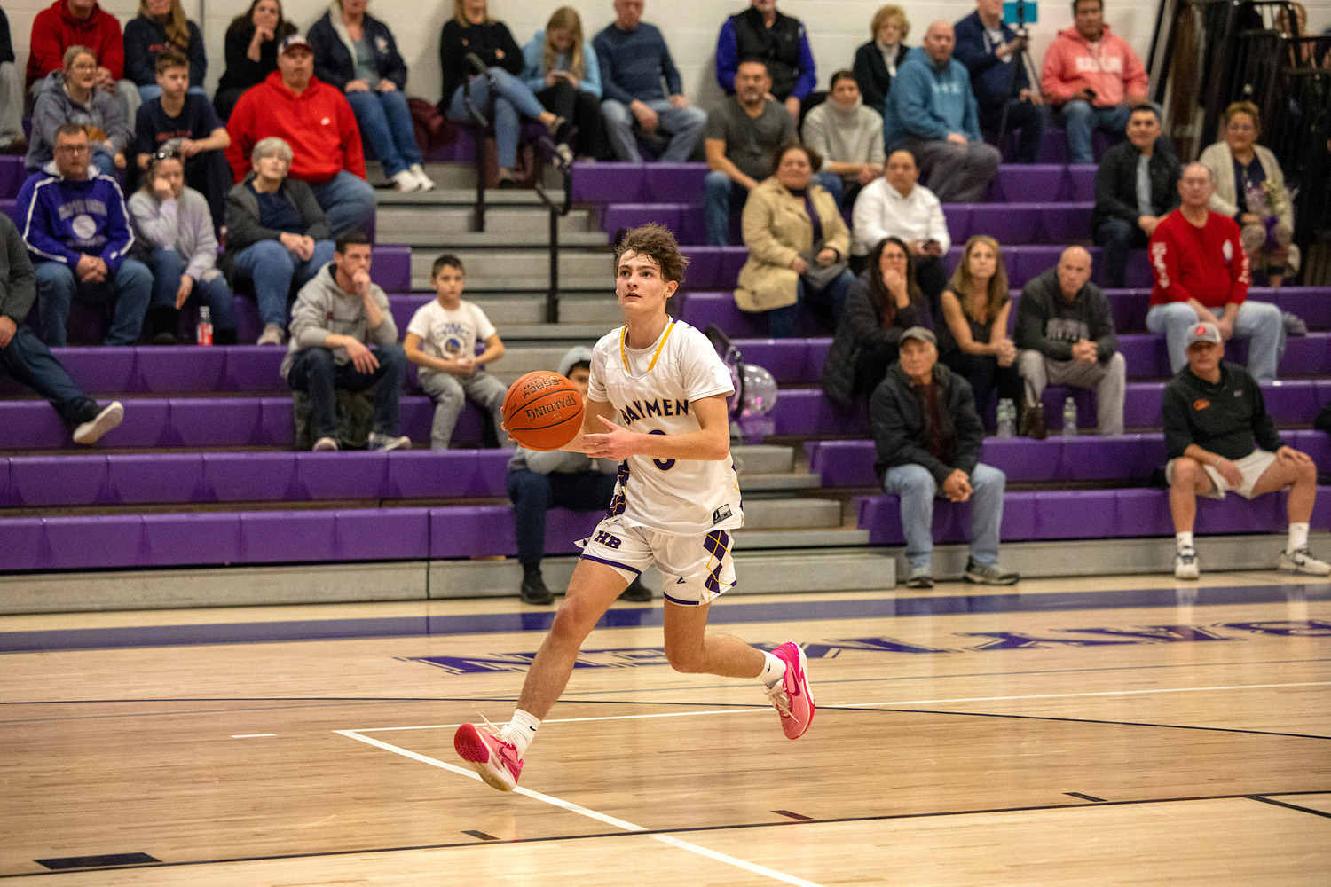 Senior guard James Powers leads a breakaway to the basket. MICHAEL O'CONNOR