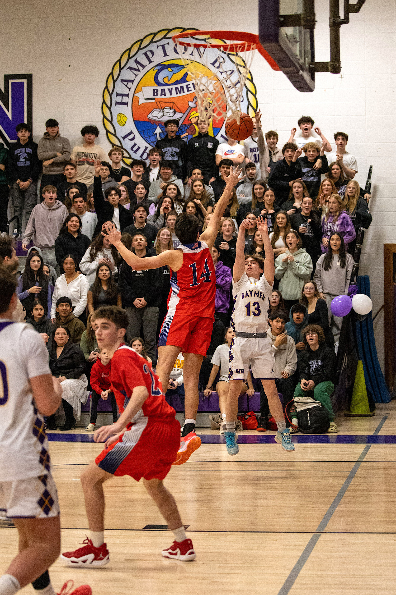 Junior guard Nate Chekijian shoots. MICHAEL O'CONNOR