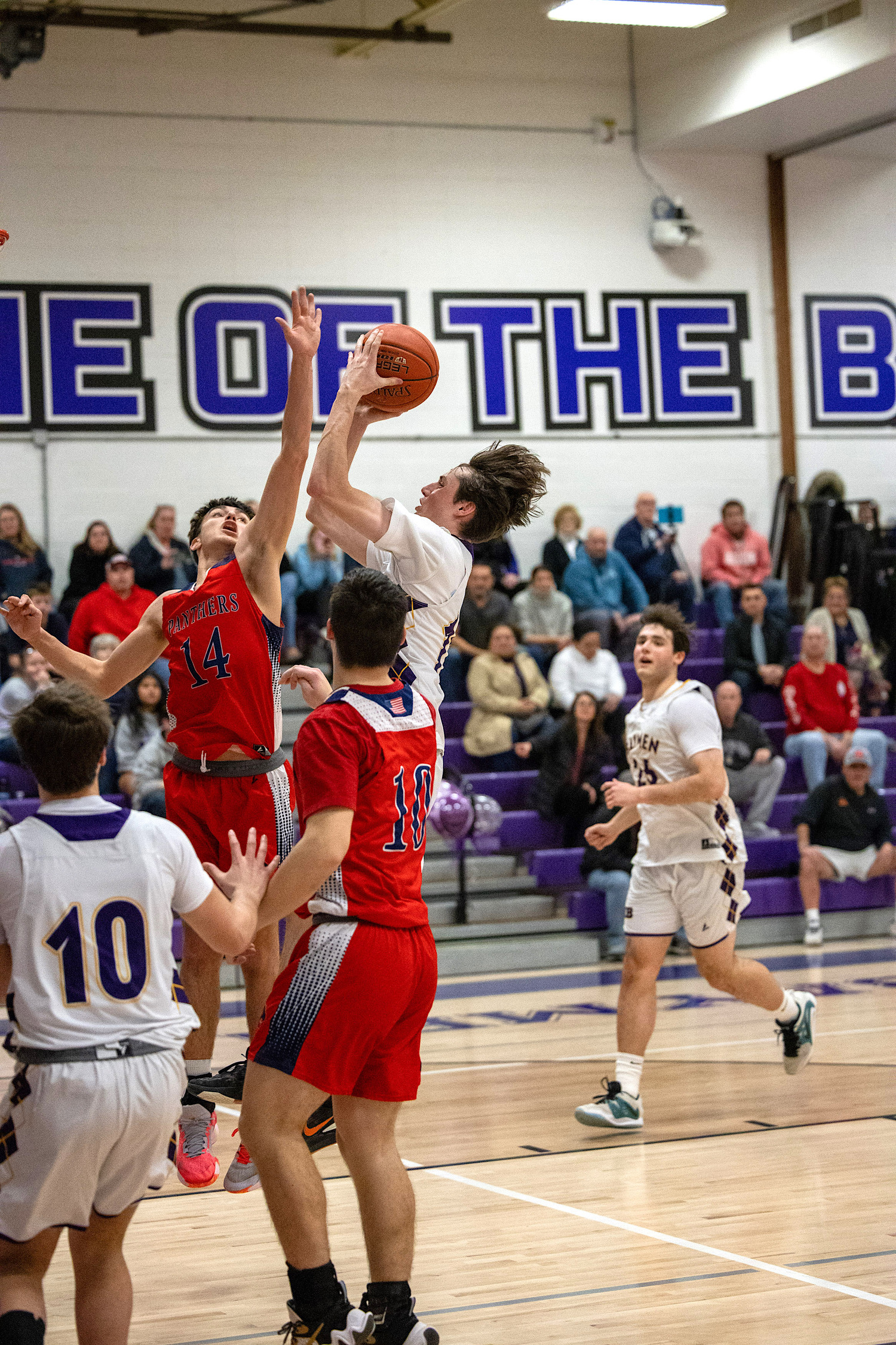 Senior guard and forward Patrick Donahue shoots through traffic. MICHAEL O'CONNOR