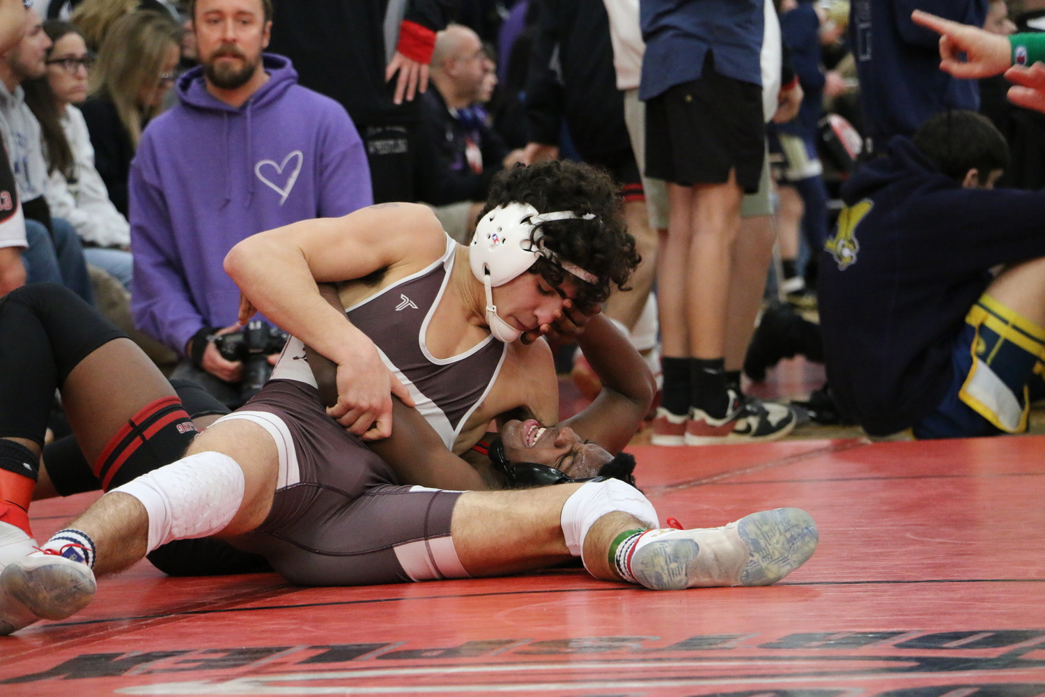Jack Nastri pinned Mount Sinai's Jeff Paul to reach the county semifinals on Friday.   ERIC NASTRI