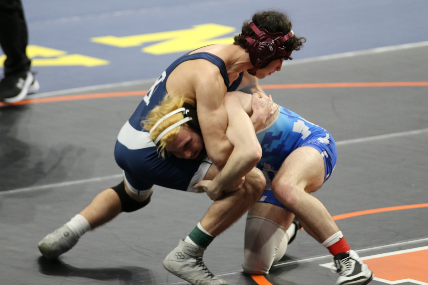 Southampton sophomore Liam Squires with a front headlock on his opponent.   ERIC NASTRI
