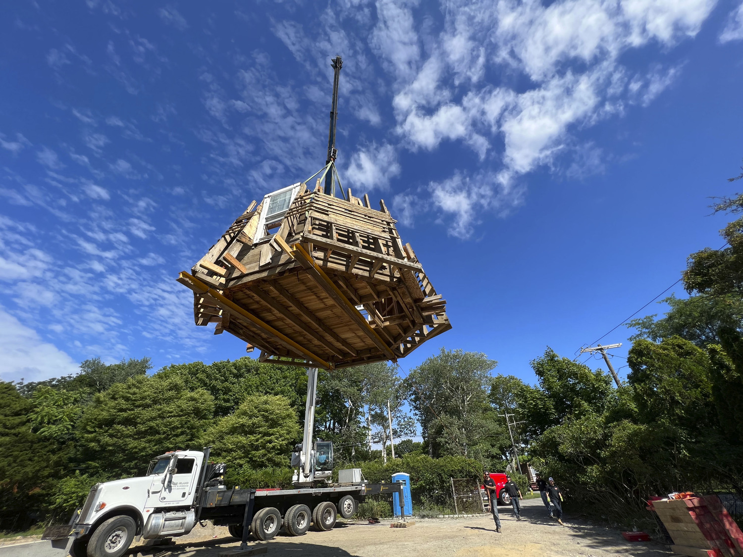 The Dix windmill being moved from its former location to the Great Lawn on July 7, 2022.  DANA SHAW