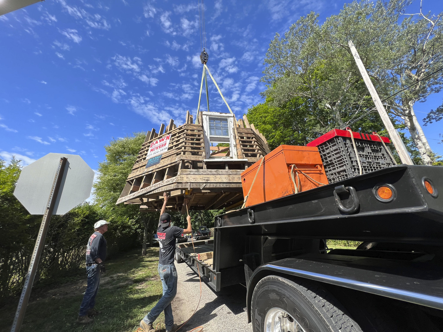 The Dix windmill being moved from its former location to the Great Lawn on July 7, 2022.  DANA SHAW