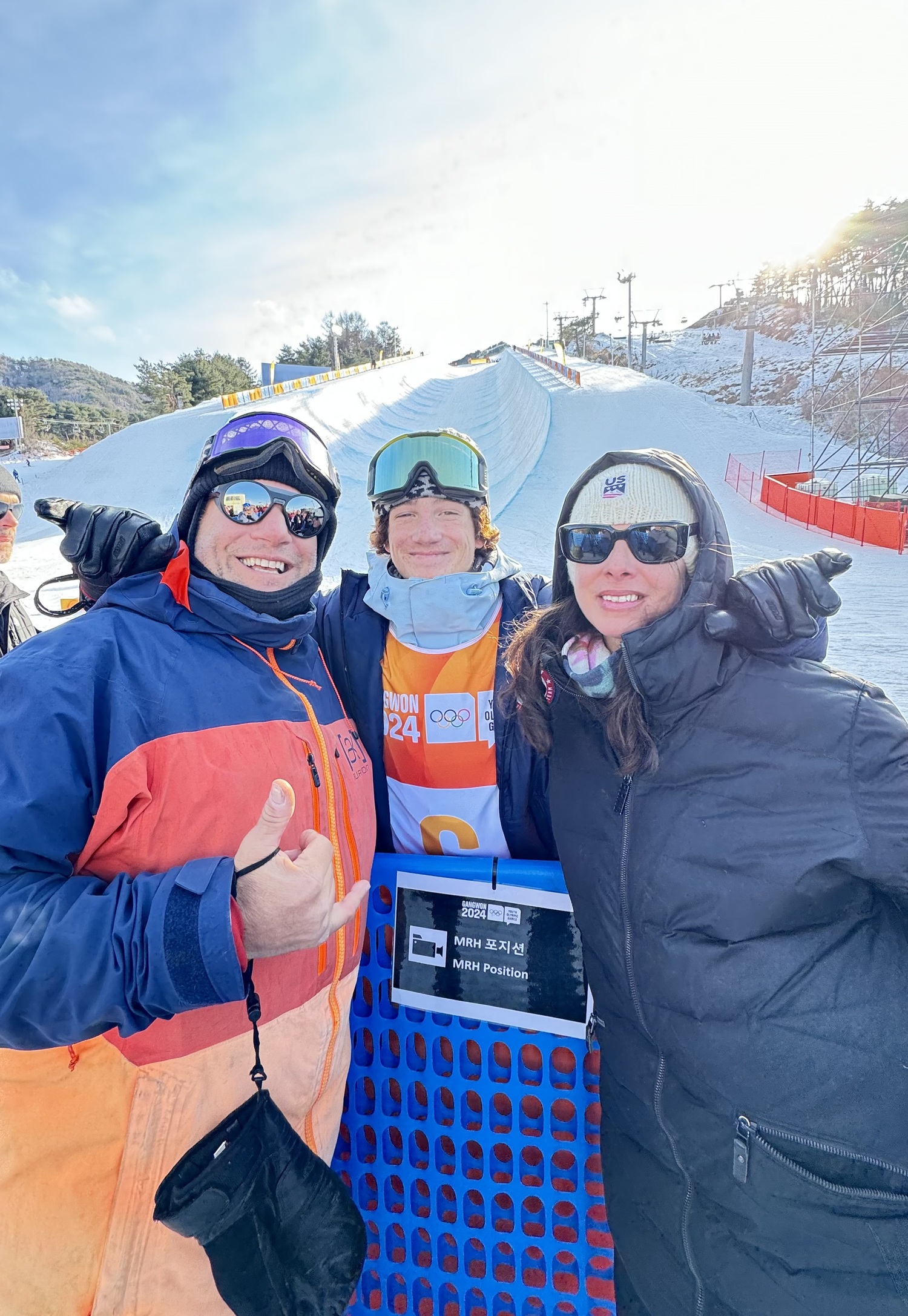 Noah Avallone, center, with his parents, Michael and Michelle, in Gangwon, South Korea. Noah competed in the men's halfpipe at the Youth Olympics there in January, representing the United States.