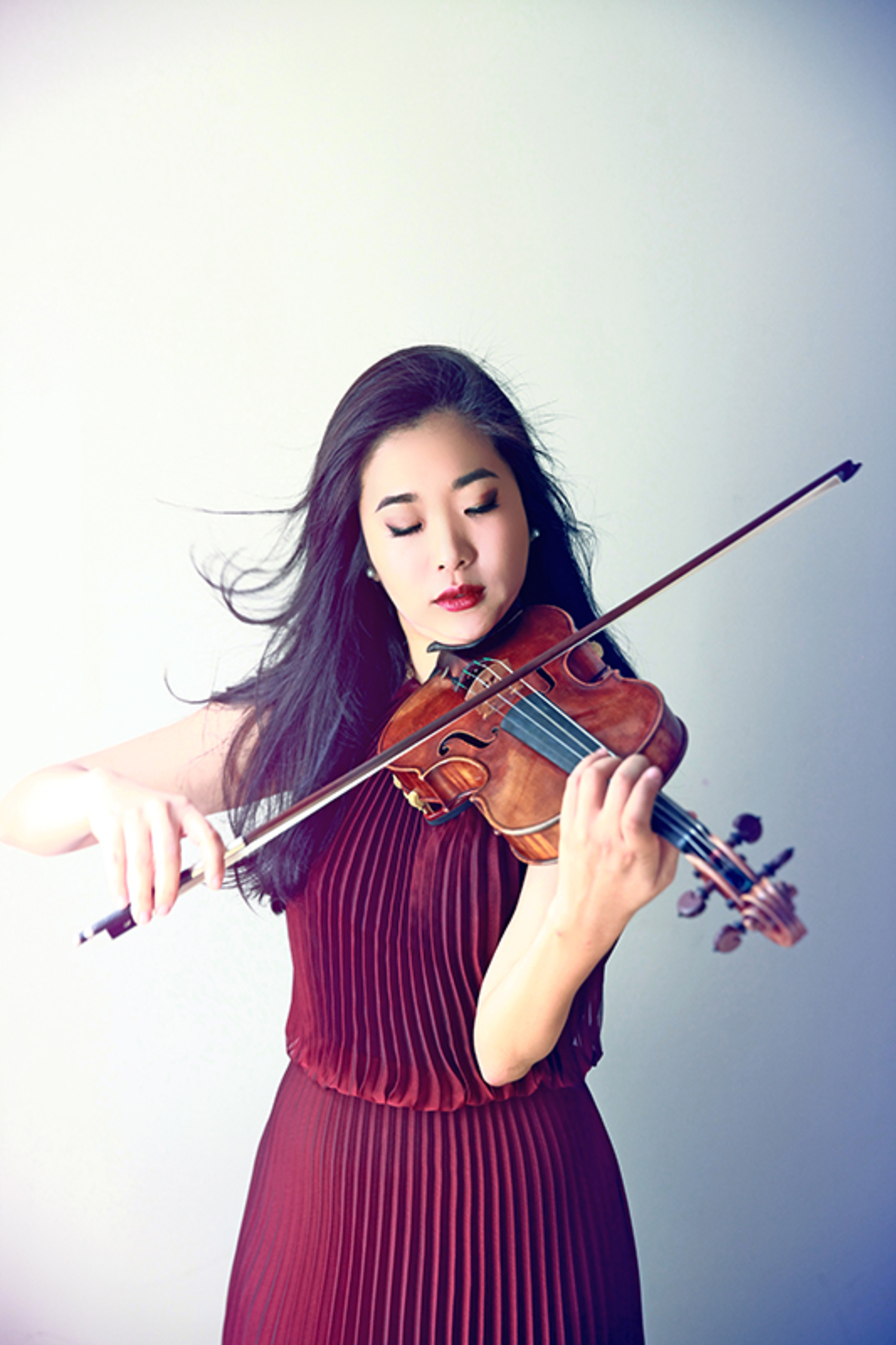 Violinist Kristin Lee performs in “Harp Fantasy,” the April 13 Bridgehampton Chamber Music concert. SOPHIE ZHAI