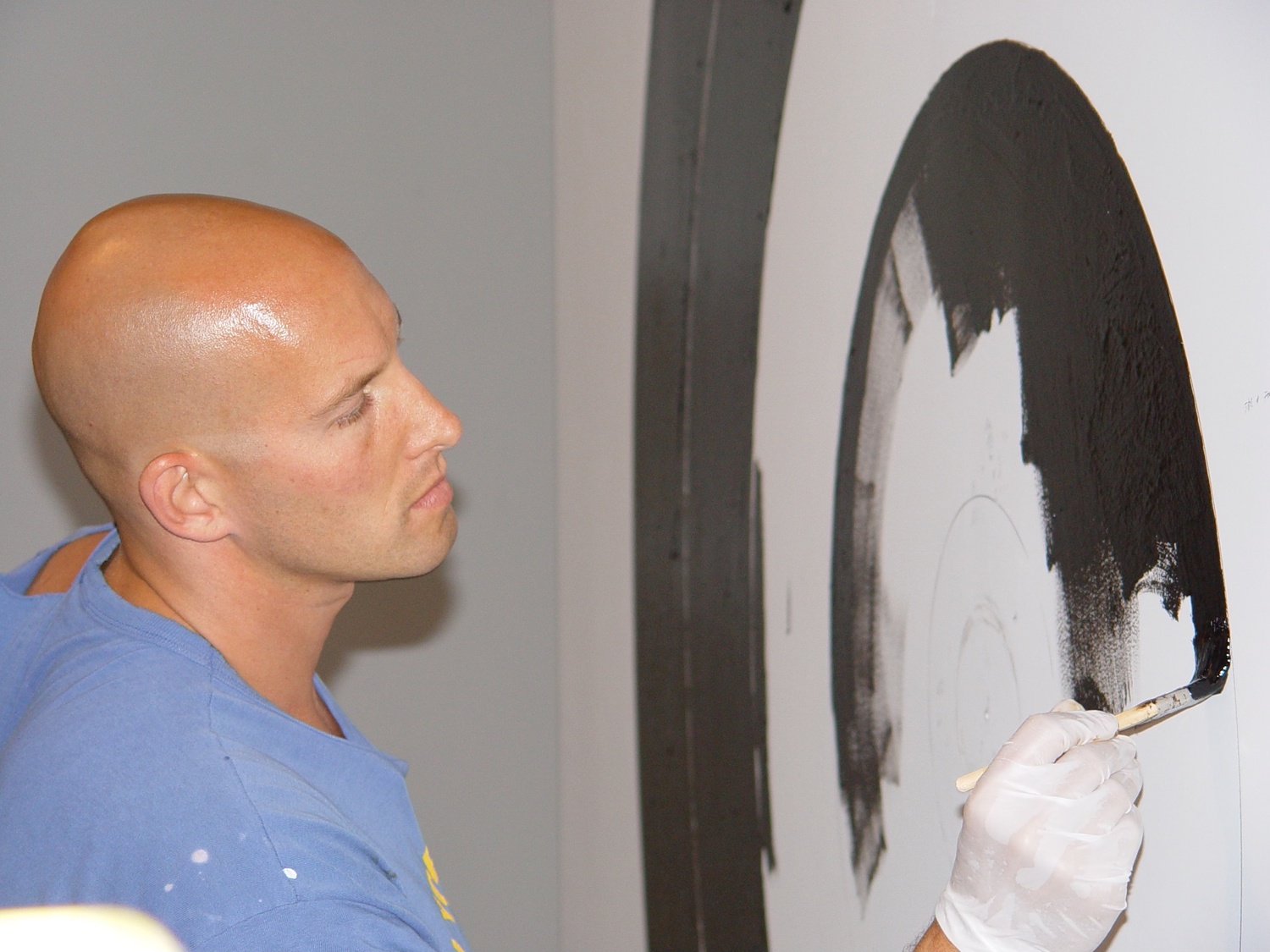 Artist Matthew Satz at work on a painting. COURTESY THE ARTIST