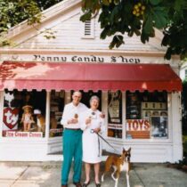 Harvey and June Morris with their dog, Chatter, at the Penny Candy Shop in Water Mill.