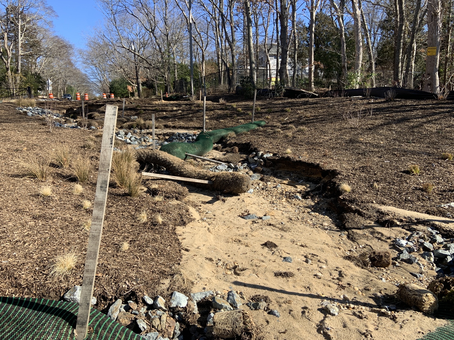 Heavy rains overwhelmed the naturalized shoreline that was constructed last September at the foot of Round Pond Lane in Sag Harbor. STEPHEN J. KOTZ