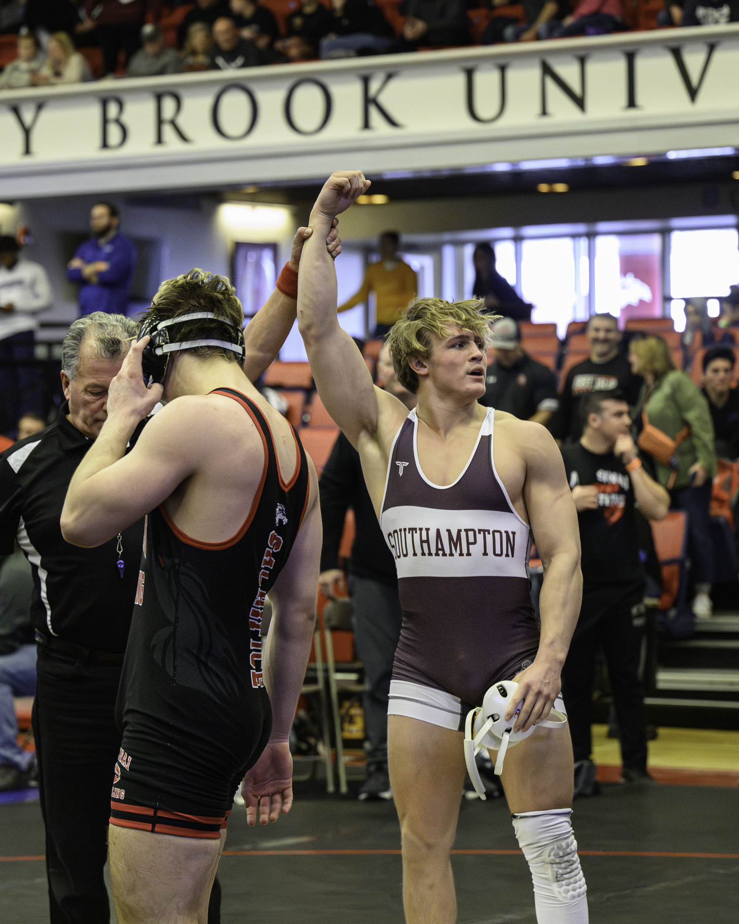 Cole Fox gets his arm raised after winning his 