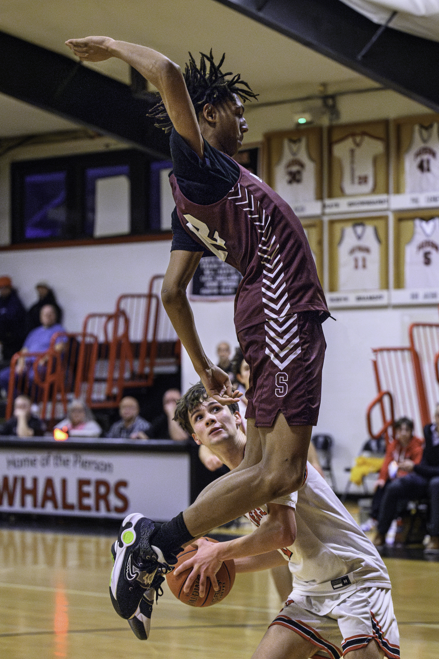 Southampton senior Nikai Pierson goes up to try and block a shot from Pierson's Ryan Ziemer.  MARIANNE BARNETT