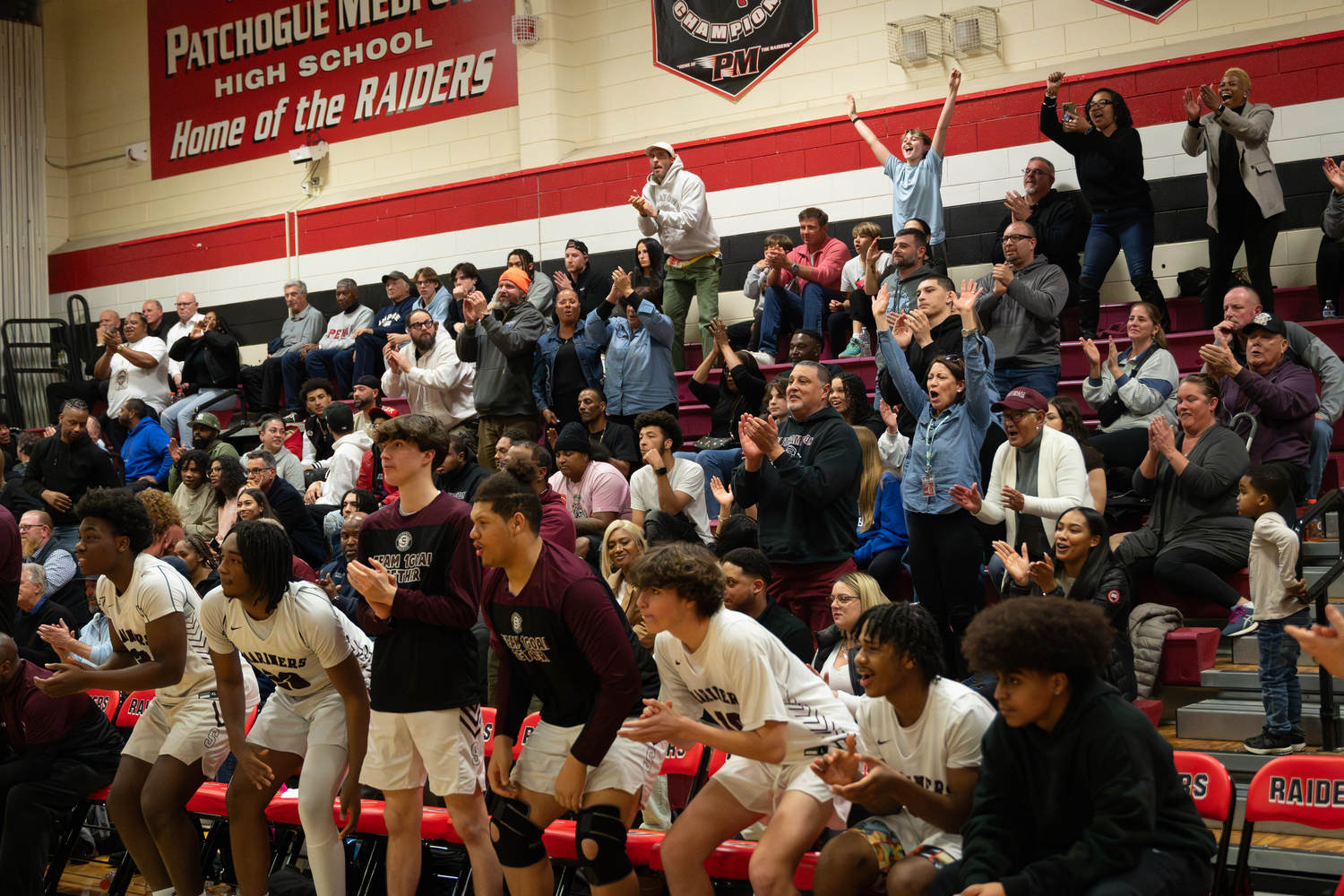 The Southampton crowd at Patchogue-Medford High School on Tuesday night gives a good ovation to its team.  RON ESPOSITO