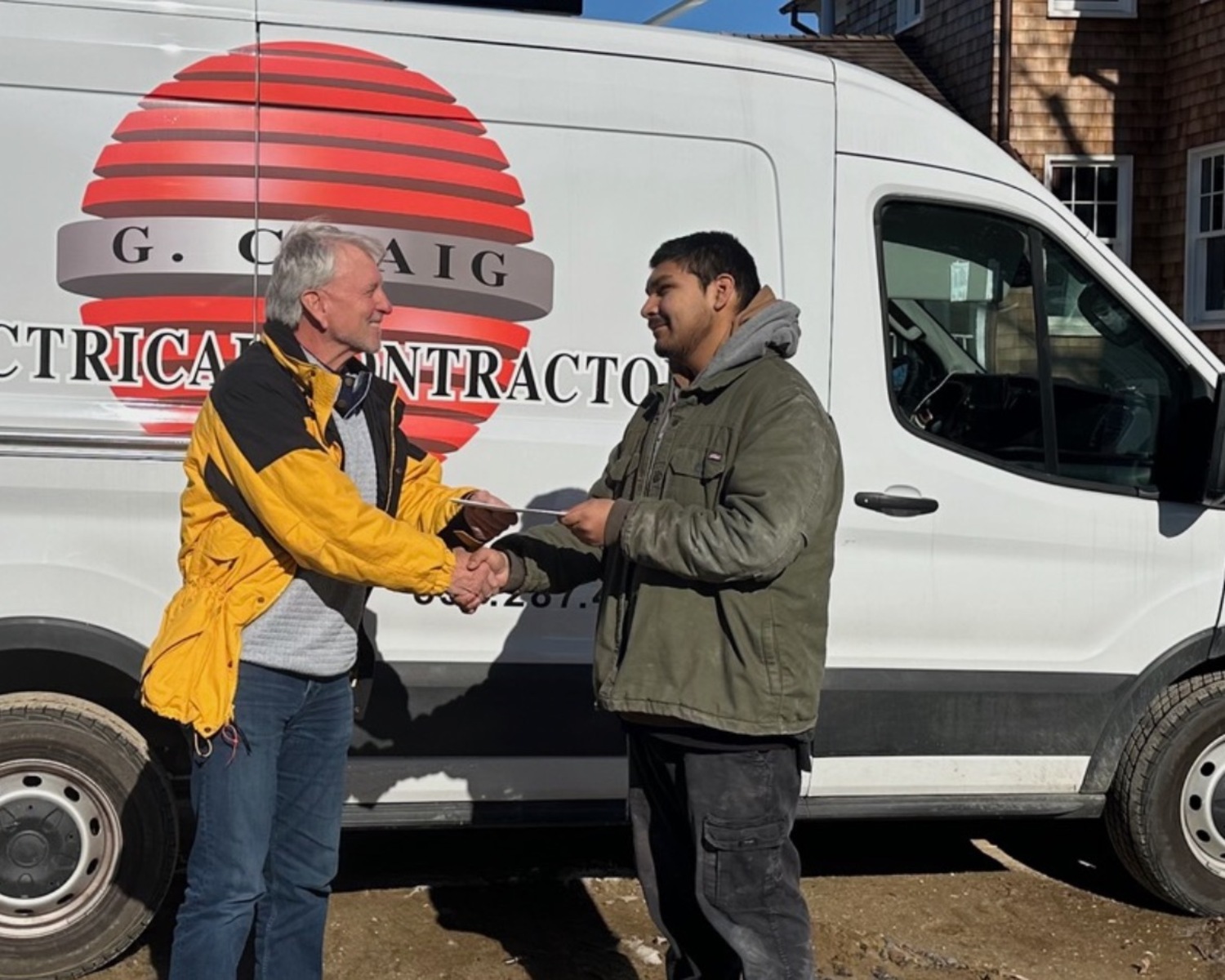 Glen Olsen of G. Craig Electric presented Southampton High School Class of 2023 graduate Ulises Munguia with the 2023 Construction Career Charitable Fund Award. COURTESY SOUTHAMPTON SCHOOL DISTRICT