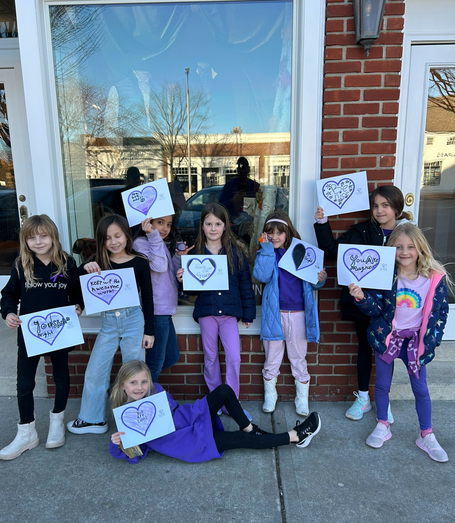 Southampton Elementary and Intermediate School students celebrated P.S. I Love You Day during the week of February 5. Students at both schools participated in assemblies with P.S. I Love You Day founder Brooke DiParma and learned about the initiative’s mission to thwart bullying and promote kindness. They wore purple to mark the day and took part in kindness activities. Additionally, members of Southampton Elementary School’s Rotary Club hung purple kindness messages in store windows around town. COURTESY SOUTHAMPTON SCHOOL DISTRICT