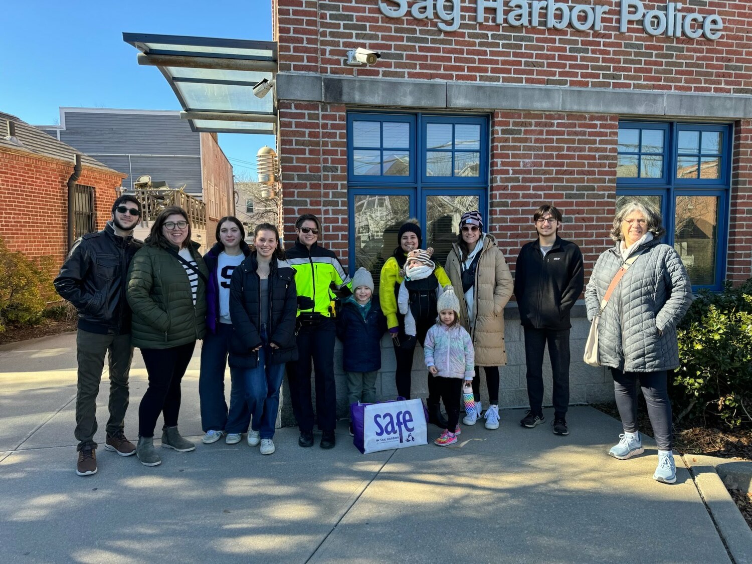 Pierson students alongside SAFE in Sag Harbor members visitedlocal establishments that sell alcohol to place awareness stickers and flyers about the dangers of selling alcohol to minors. COURTESY SAG HARBOR SCHOOL DISTRICT