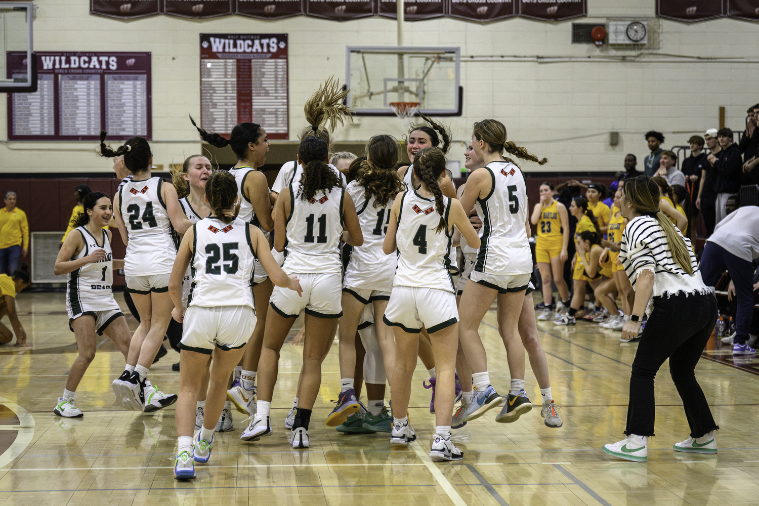Westhampton Beach's girls basketball team celebrates reaching the Suffolk County championship game for the first time since 2020. MARIANNE BARNNETT