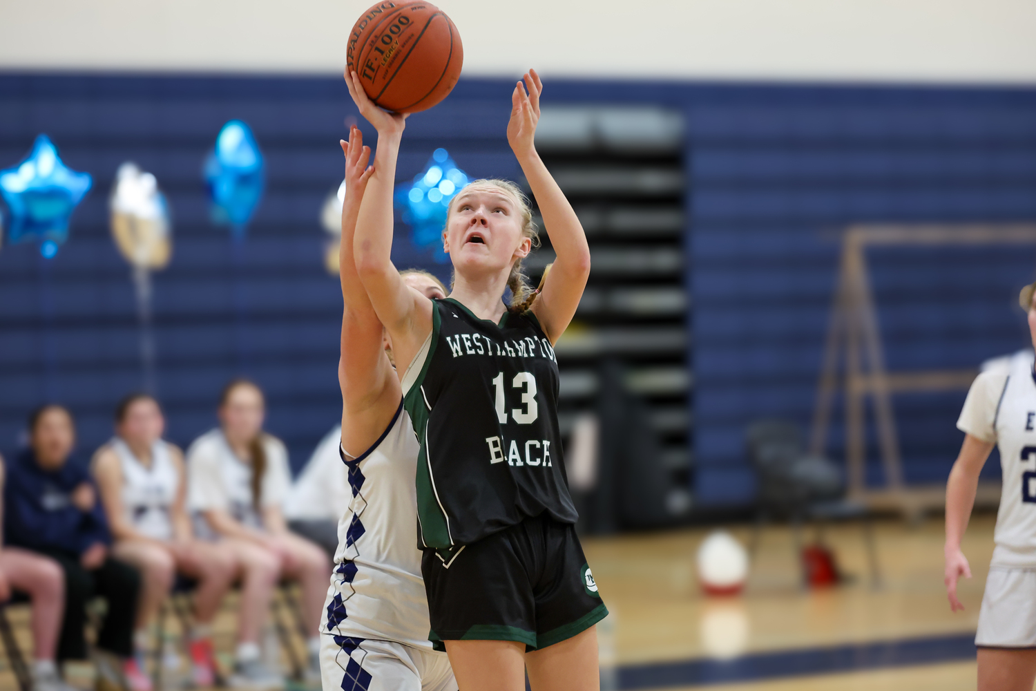 Freshman guard Kate Sweet shoots. RON ESPOSITO