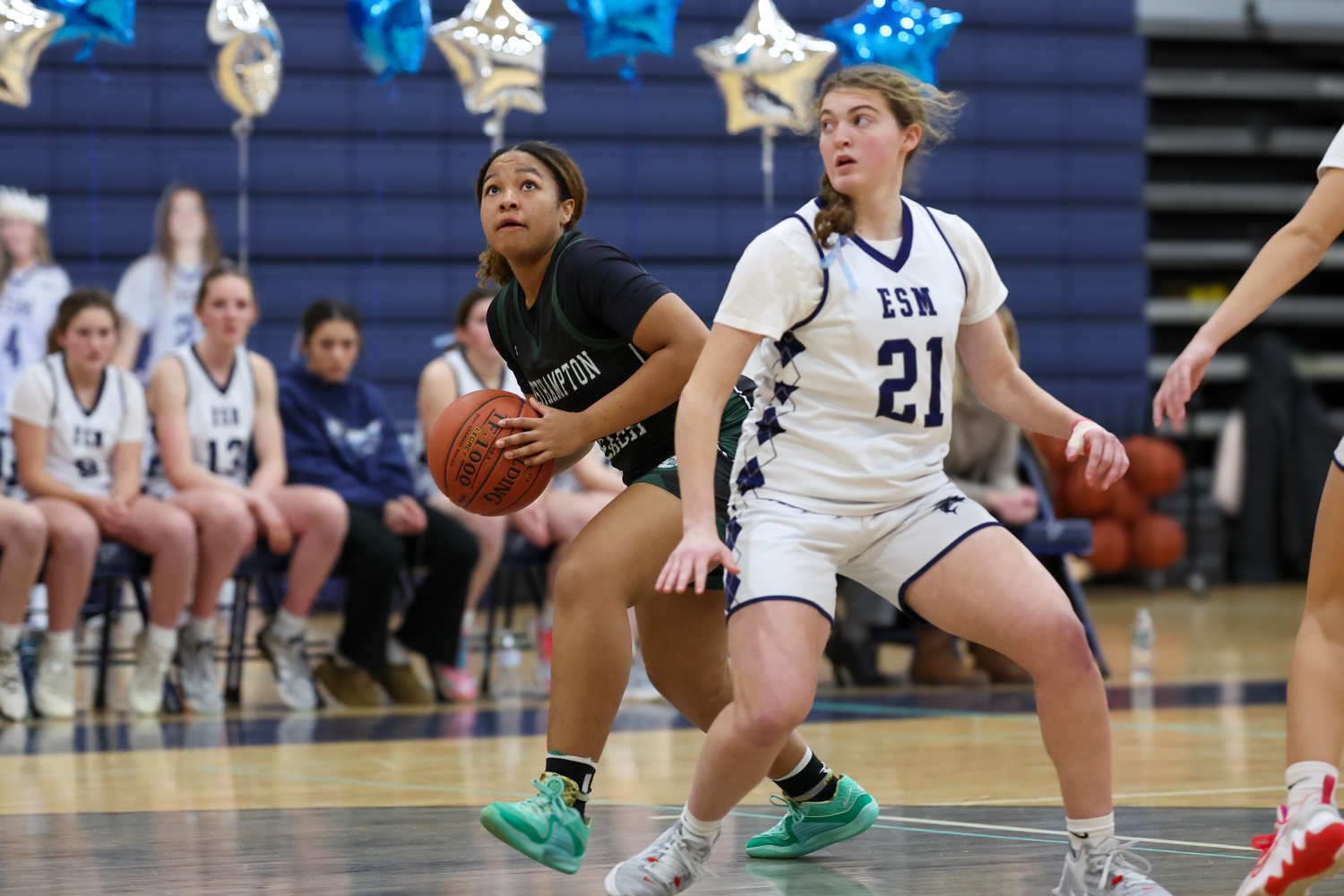 Sophomore point guard Sandra Clarke looks to the basket. RON ESPOSITO