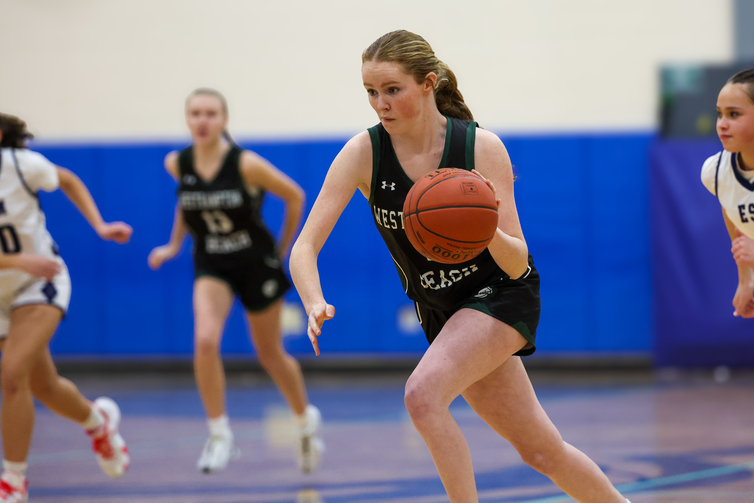 Senior guard Sarah Gormley carries the ball into play. RON ESPOSITO