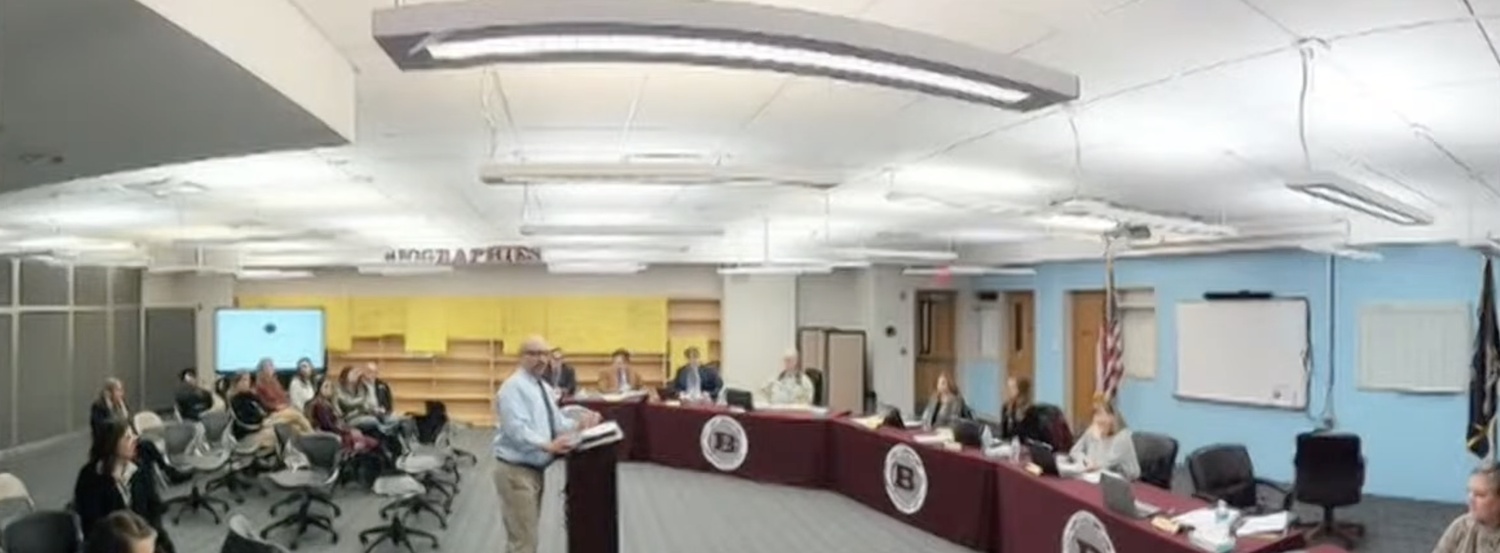 East Hampton Superintendent Adam Fine presents budget challenges for the 2024-25 school year during the February 6 board of education meeting.