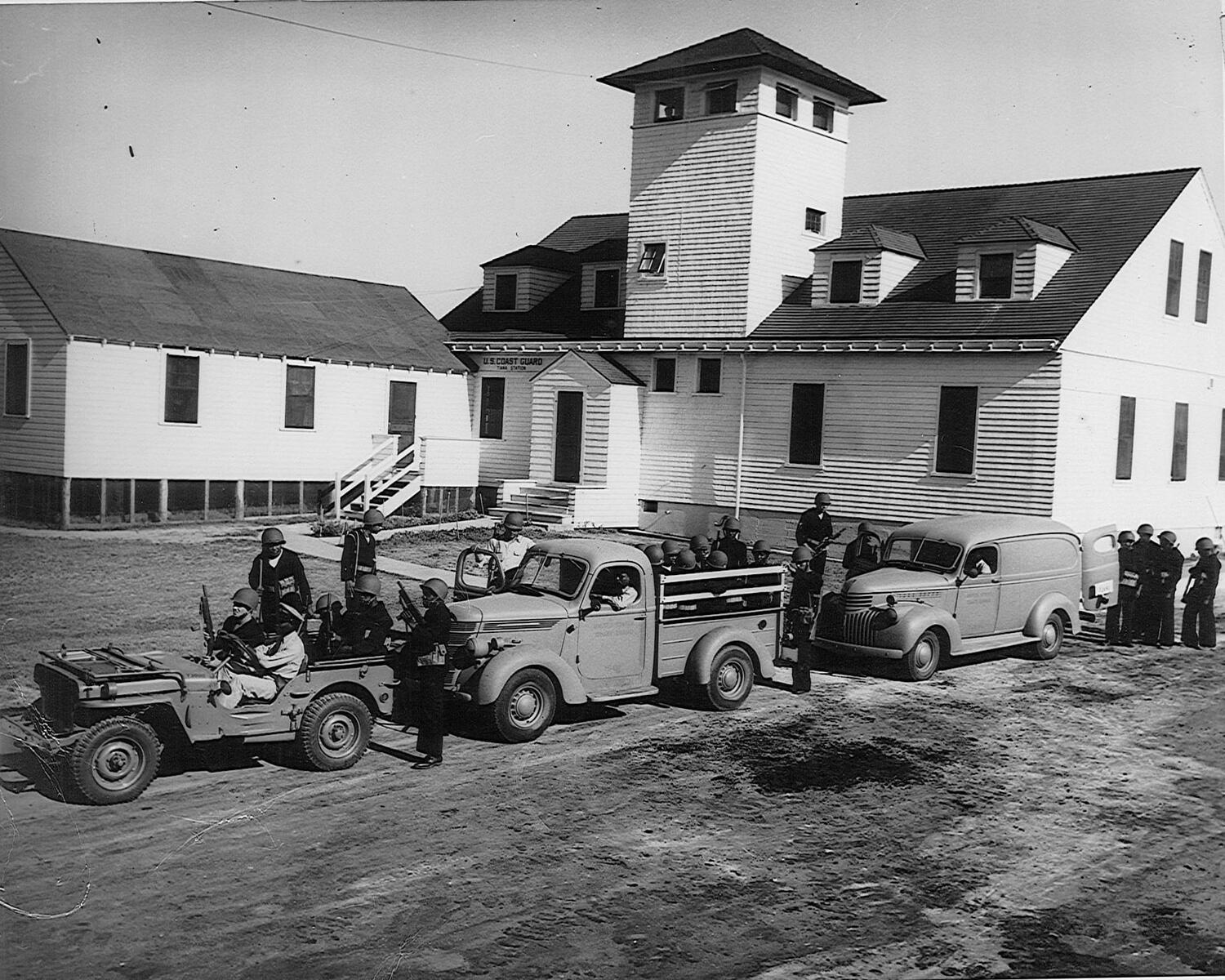 U.S. military vehicles and personnel on the move at the Tiana Bay Lifesaving Station, circa World War II. TOWN OF SOUTHAMPTON