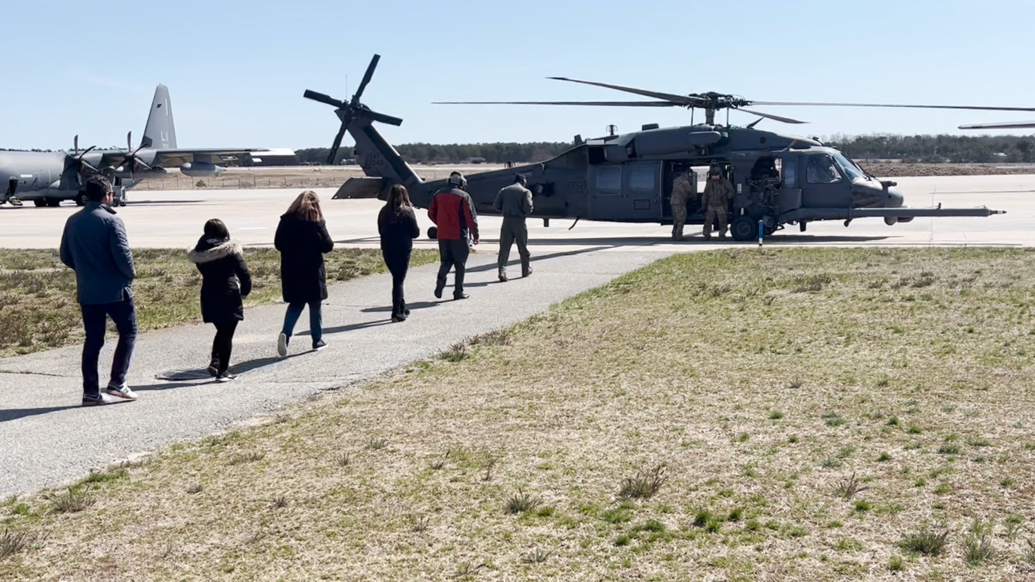 Area guidance counselors prepare to board an HH-60G Pave Hawk Helicopter at the 106th Air Wing in Westhampton.  COURTESY 106TH AIR WING