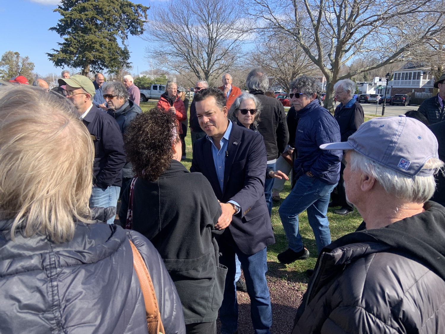 Democratic congressional candidate John Avlon greets well wishers after kicking off his campaign in Sag Harbor on Saturday. STEPHEN J. KOTZ