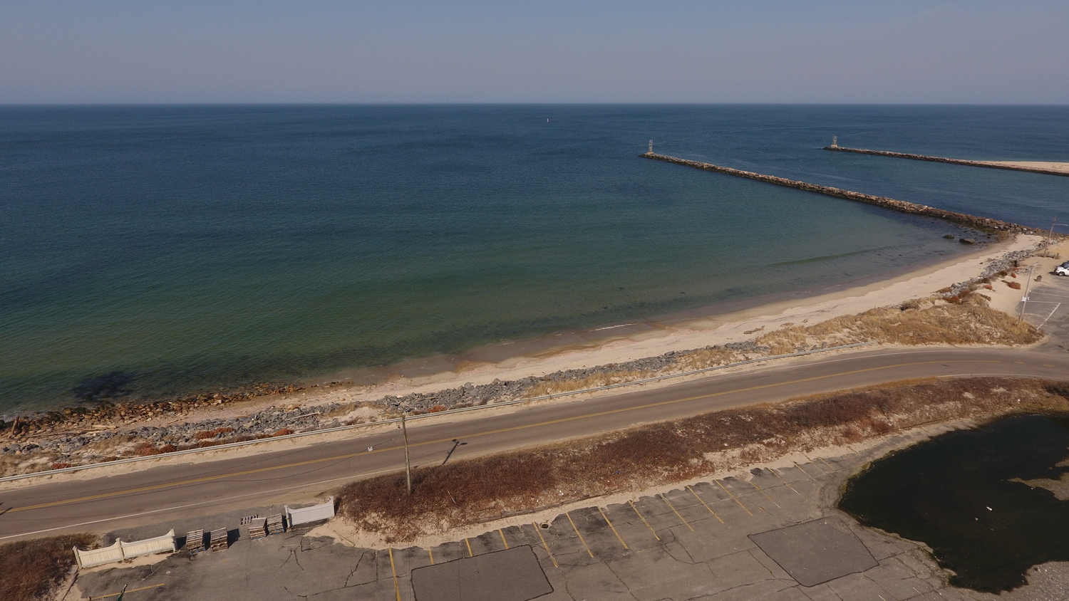 The Army Corps of Engineers is redesigning its plans for dredging Montauk Inlet and says that it will only be able to rebuild about 1,200 feet of beach west of the inlet with the sand taken out of the inlet, rather than more than 3,000 feet it had hoped. Surveys of the shoal inside the inlet revealed that large boulders will make it too difficult to remove sand from an area inside the harbor. MICHAEL WRIGHT